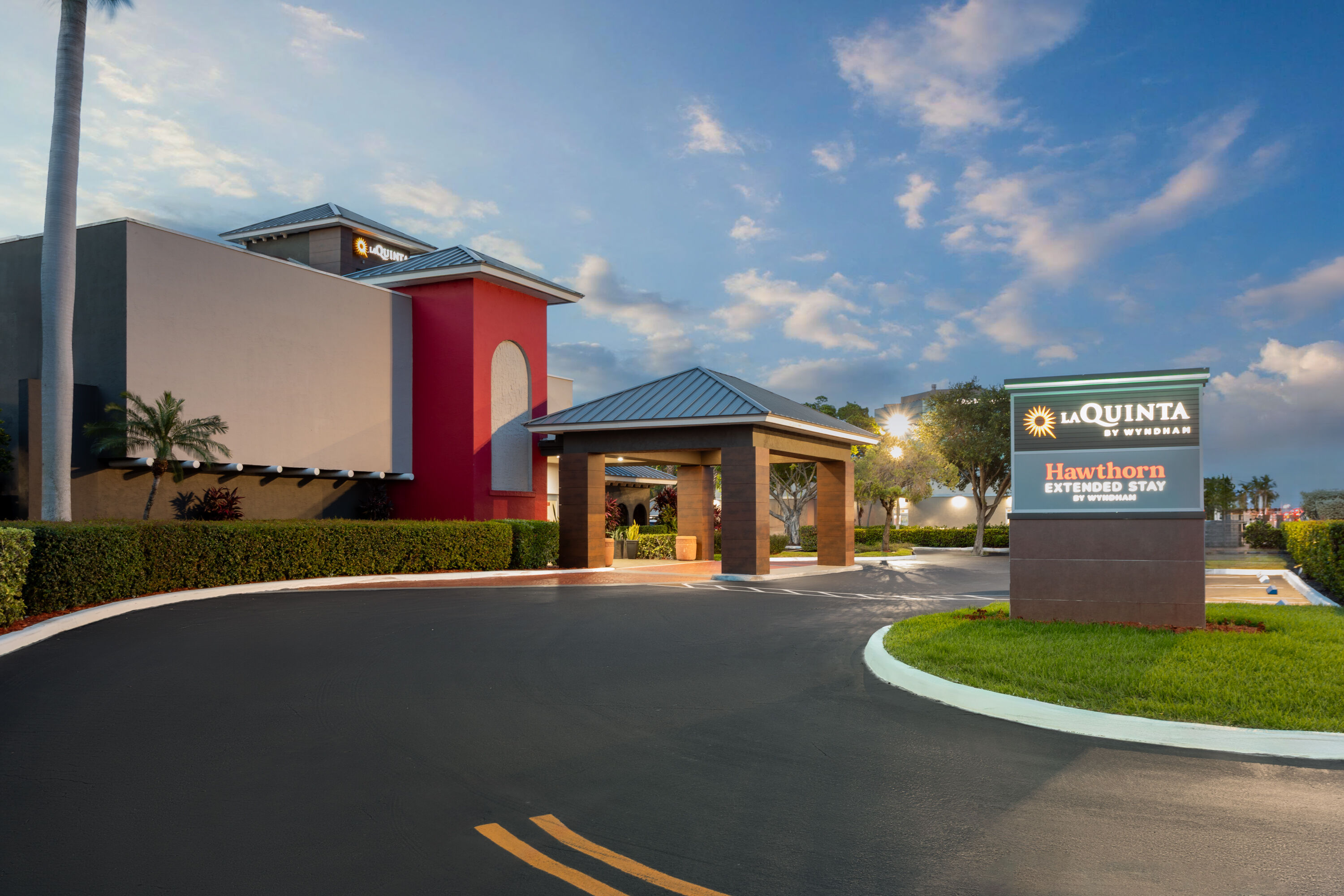 Exterior Dusk Image of Hawthorn Extended Stay by Wyndham Ft Lauderdale Cypress Crk hotel in Fort Lauderdale, Florida