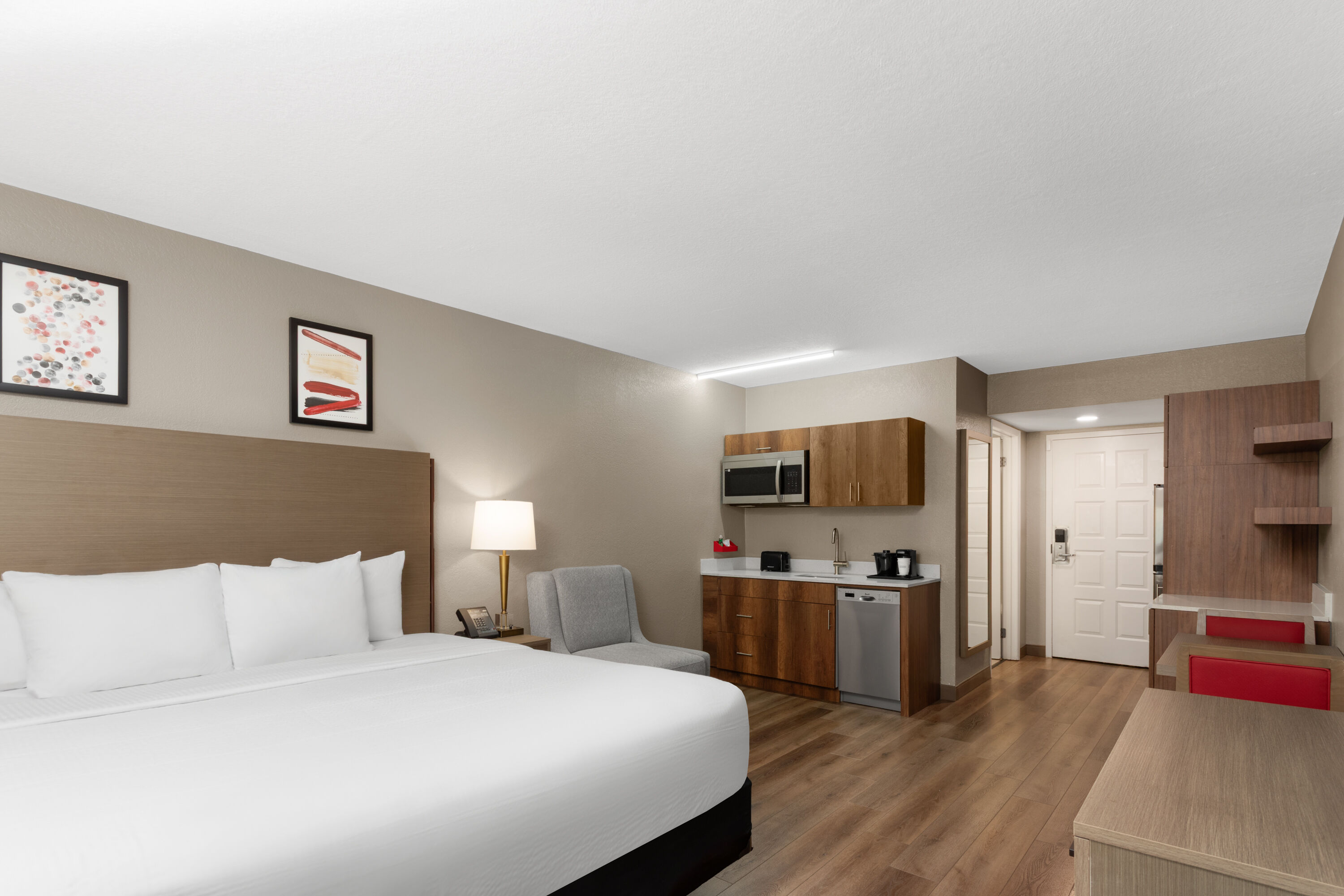 Guest room at the Hawthorn Extended Stay by Wyndham Ft Lauderdale Cypress Crk in Fort Lauderdale, Florida