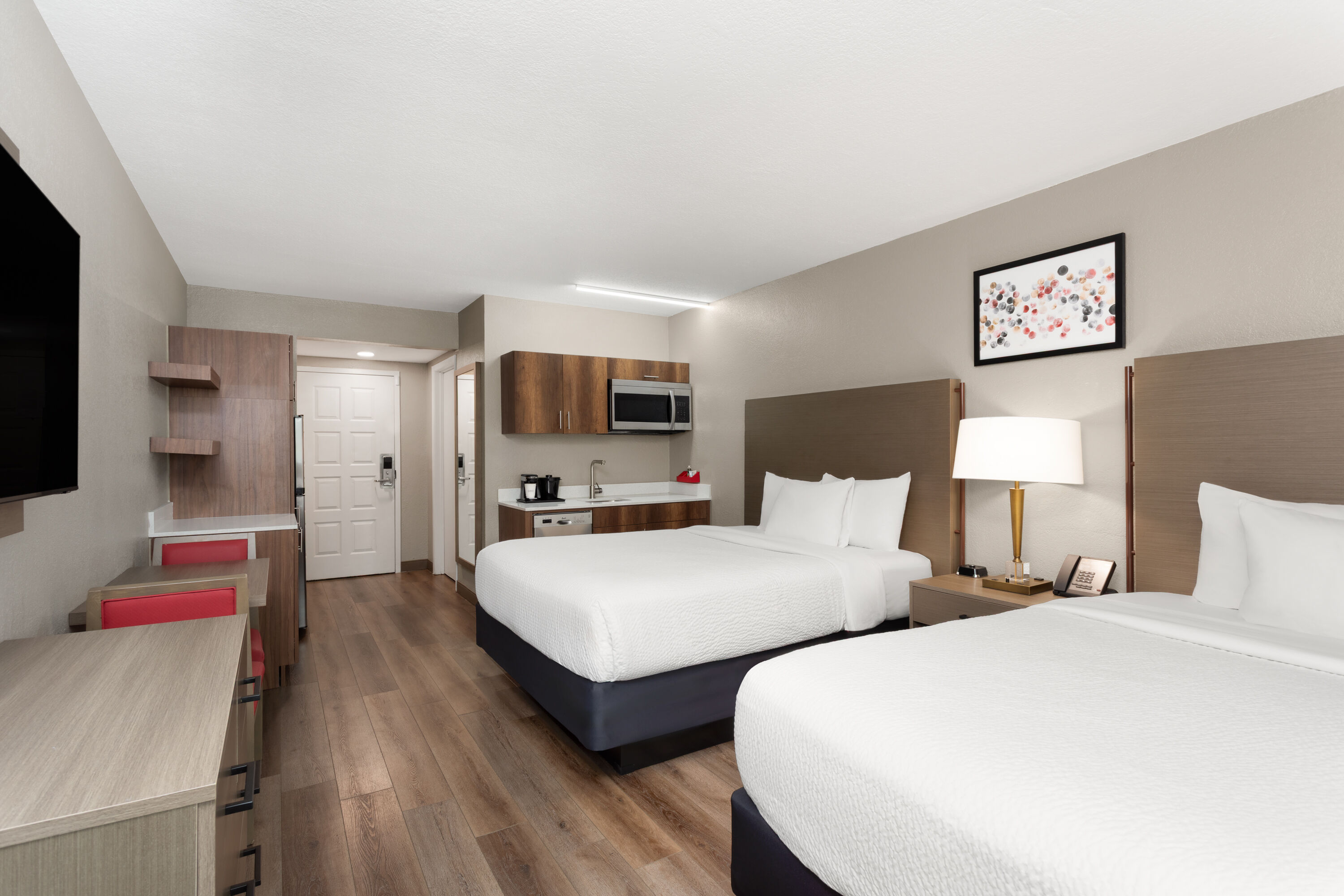 Guest room at the Hawthorn Extended Stay by Wyndham Ft Lauderdale Cypress Crk in Fort Lauderdale, Florida
