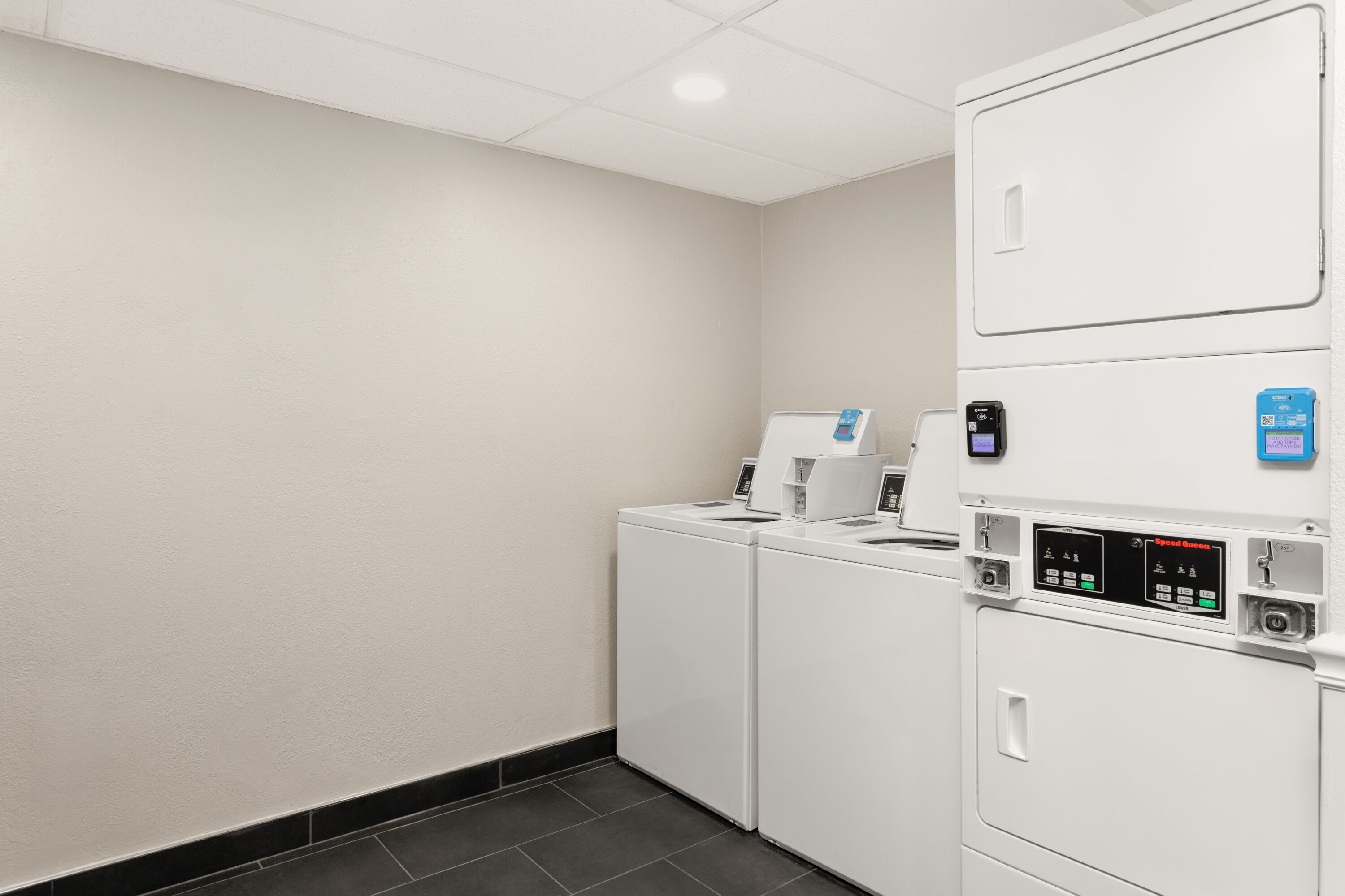 Laundry facilities at Hawthorn Extended Stay by Wyndham Ft Lauderdale Cypress Crk in Fort Lauderdale, Florida
