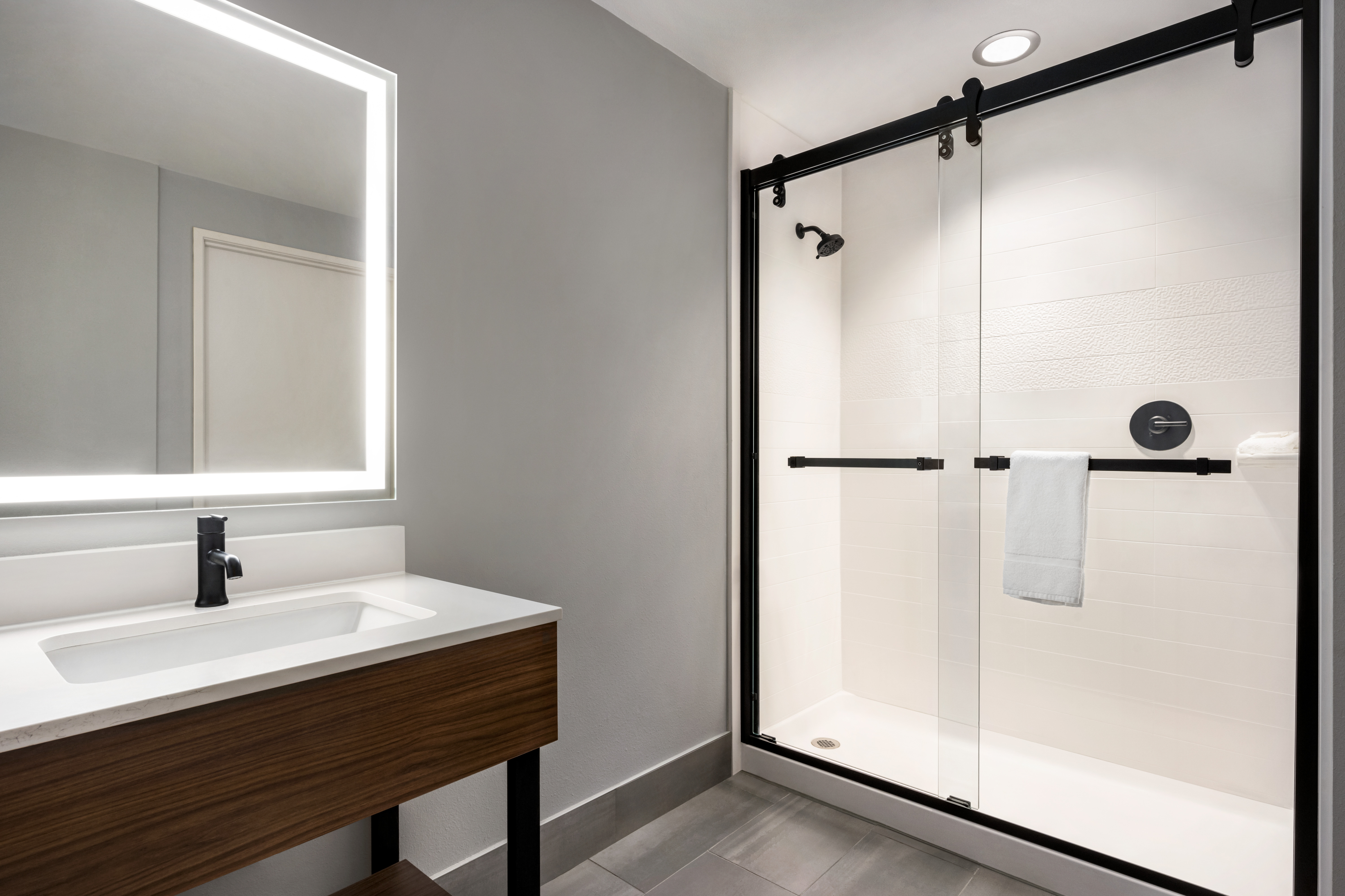 Guest room bath at the Hawthorn Extended Stay by Wyndham Del Rio in Del Rio, Texas