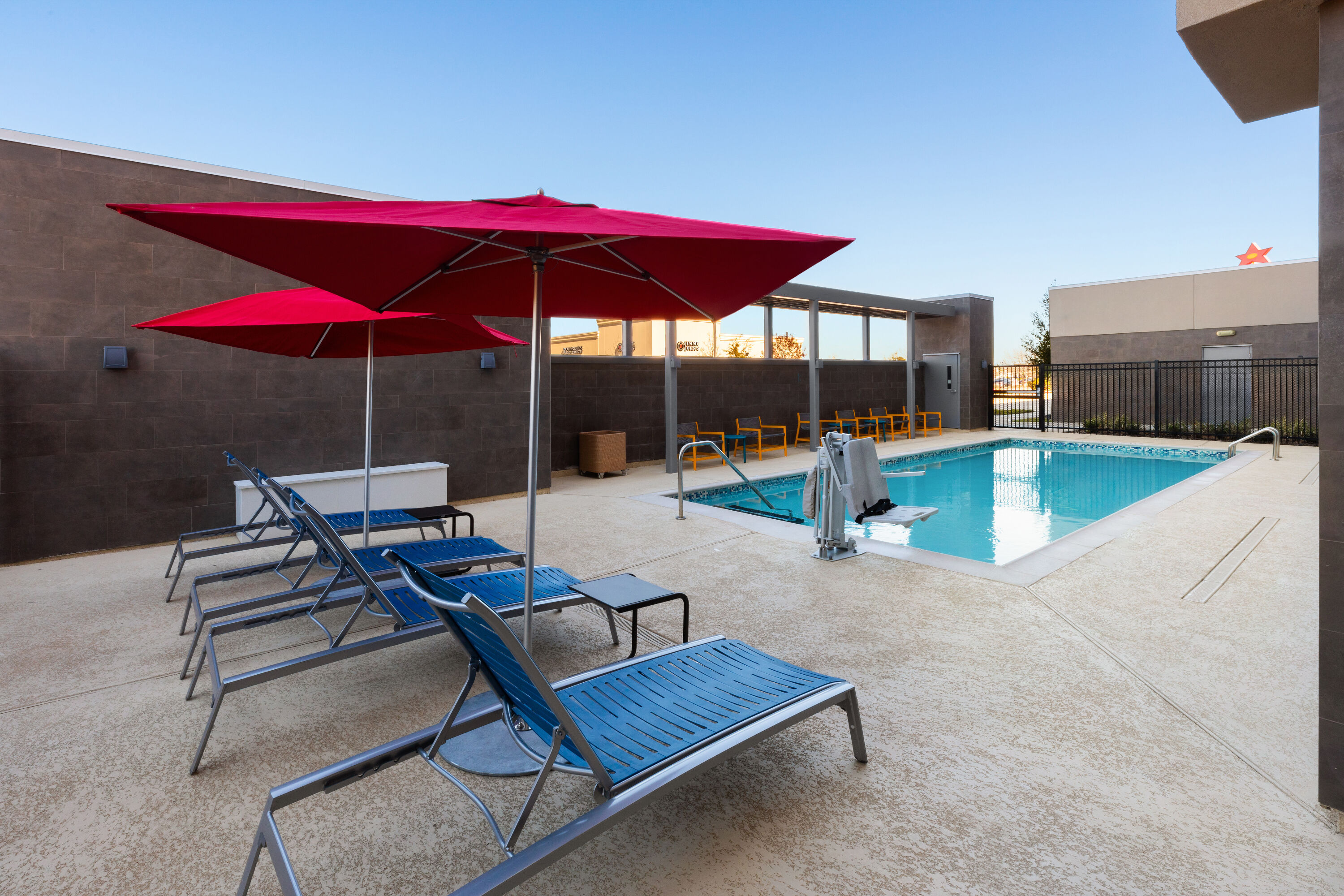 Pool daytime image at the Hawthorn Extended Stay by Wyndham Kingwood/Houston in Kingwood, Texas