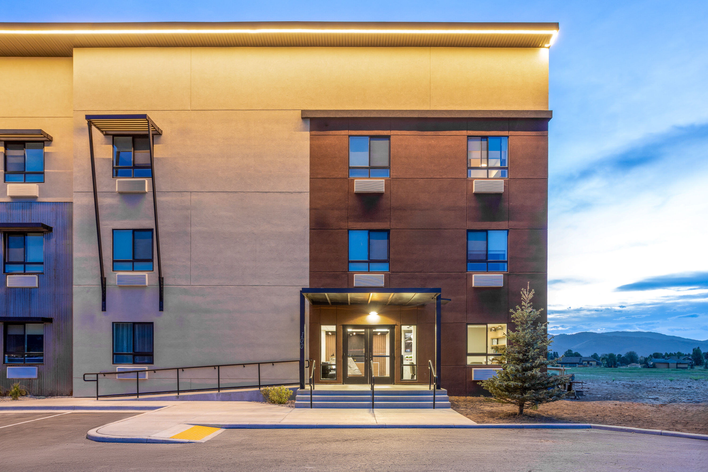 Exterior Dusk Image of Hawthorn Extended Stay by Wyndham Jackson Alpine hotel in Alpine, Wyoming