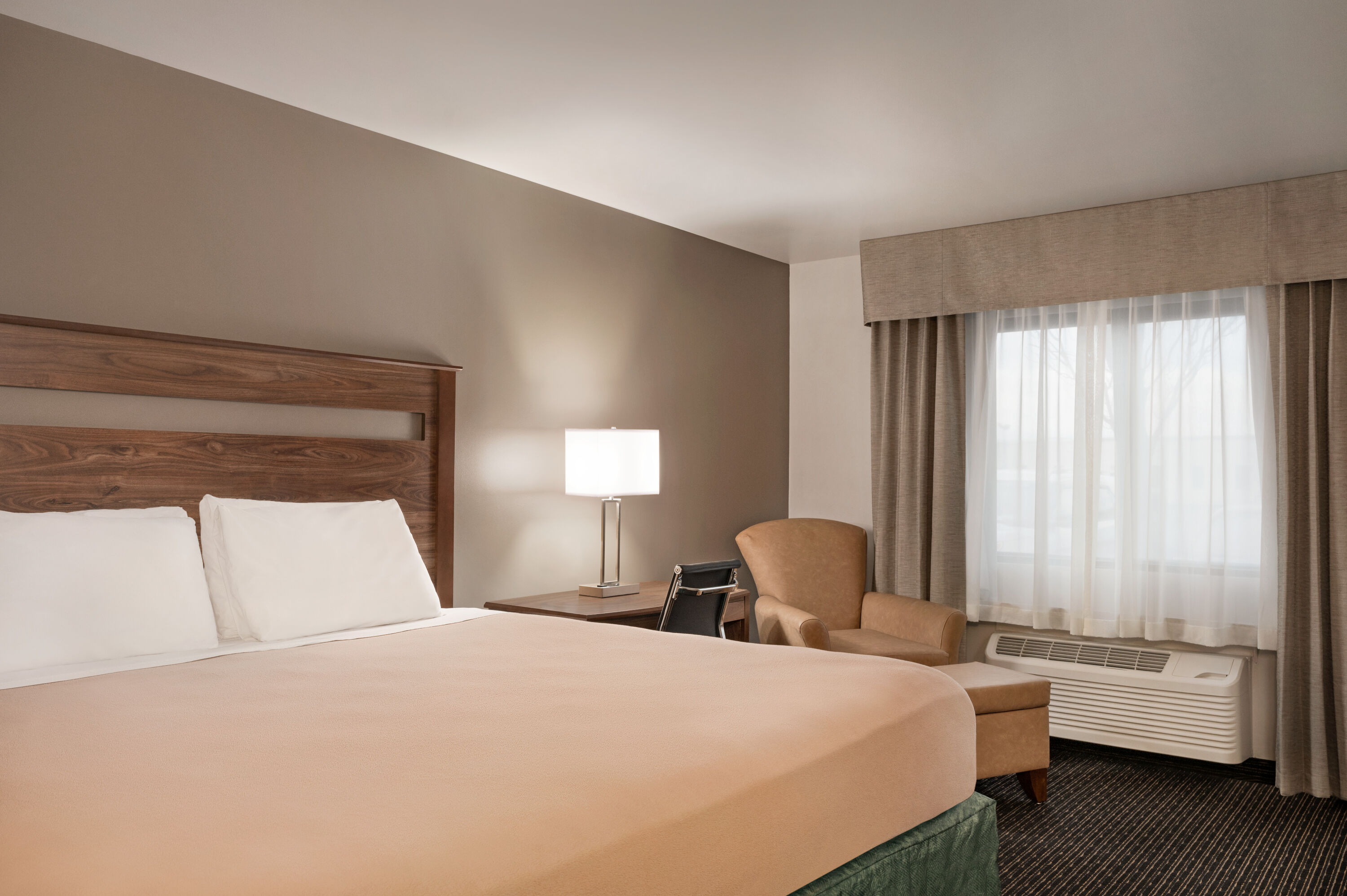 Guest room at the Baymont by Wyndham Buffalo in Buffalo, New York