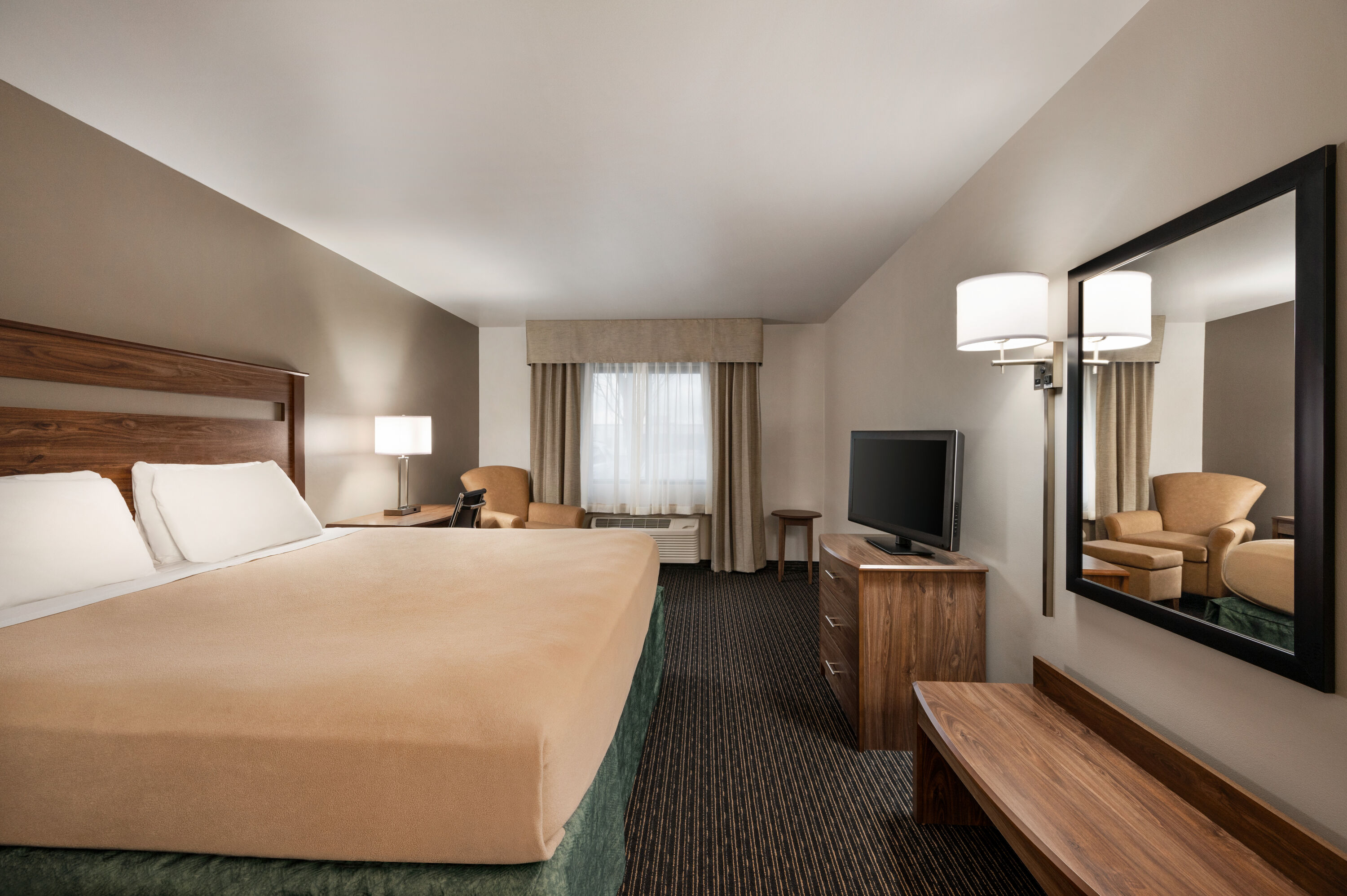 Guest room at the Baymont by Wyndham Buffalo in Buffalo, New York