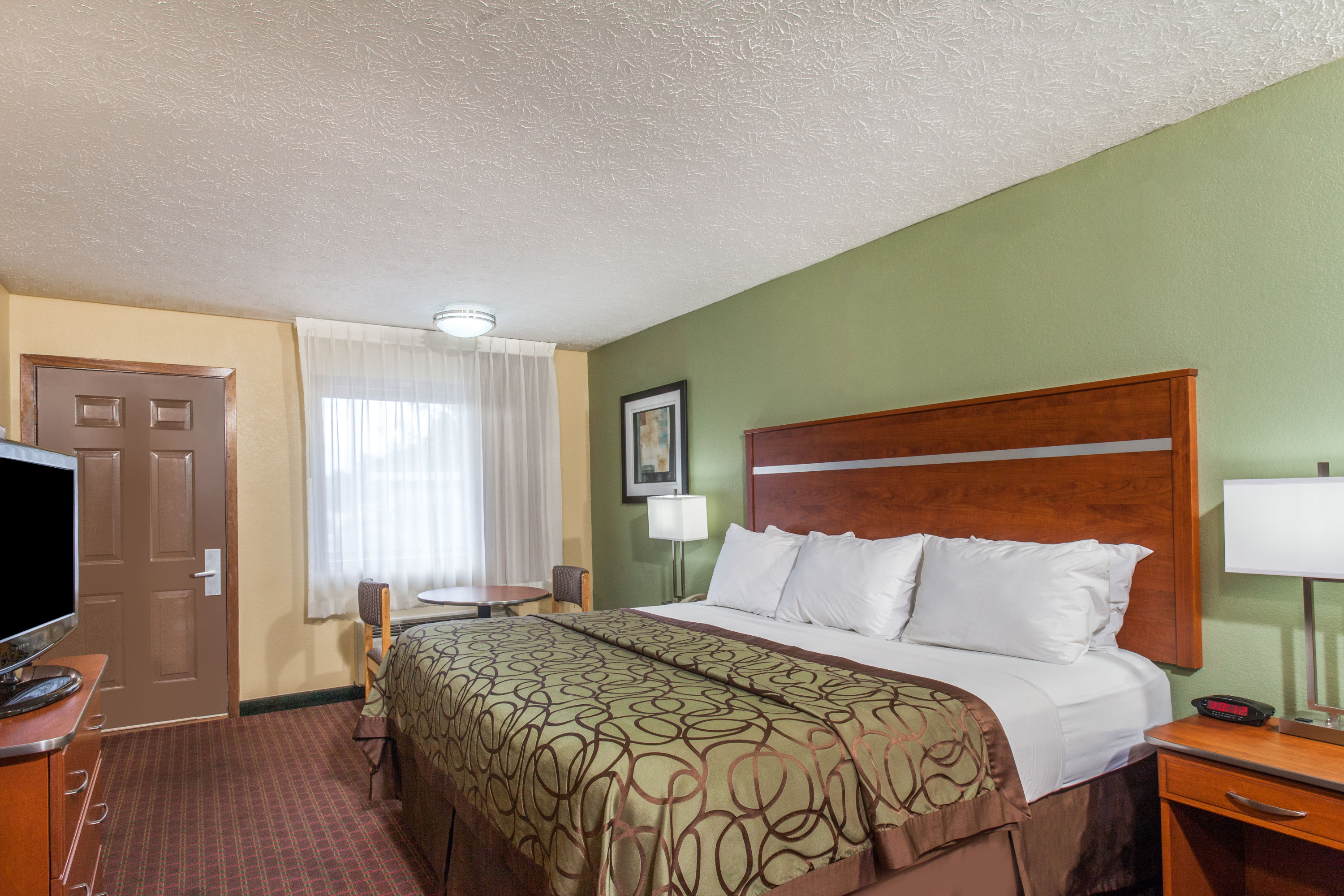 Guest room at the Baymont by Wyndham Pigeon Forge near Island Drive in Pigeon Forge, Tennessee
