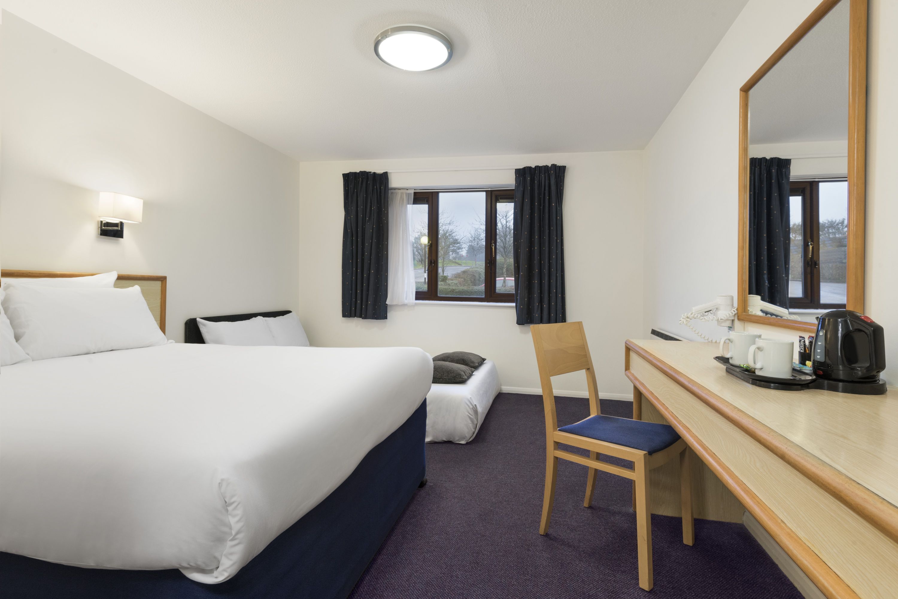Guest room at the Days Inn by Wyndham Bridgend Cardiff M4 in Bridgend, Other than US/Canada