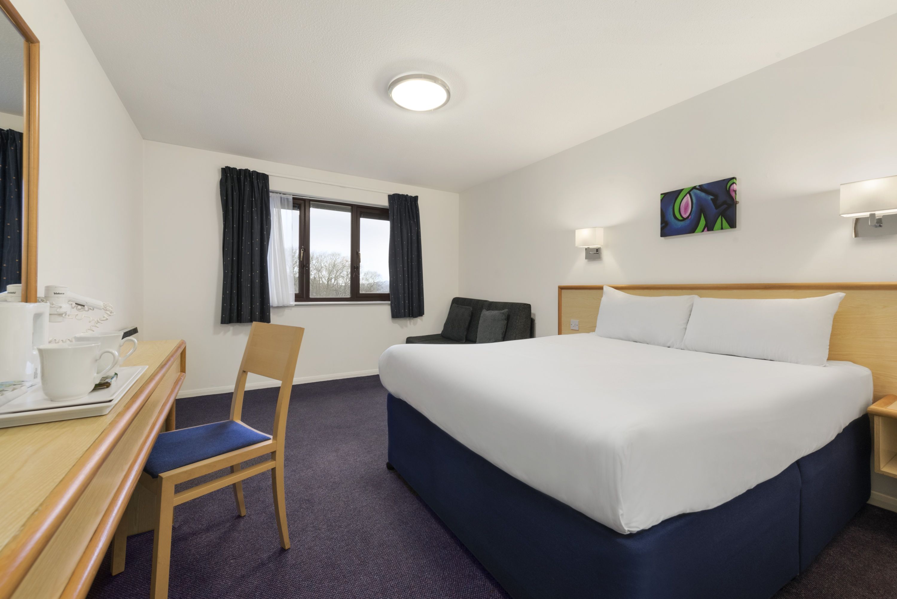 Guest room at the Days Inn by Wyndham Bridgend Cardiff M4 in Bridgend, Other than US/Canada