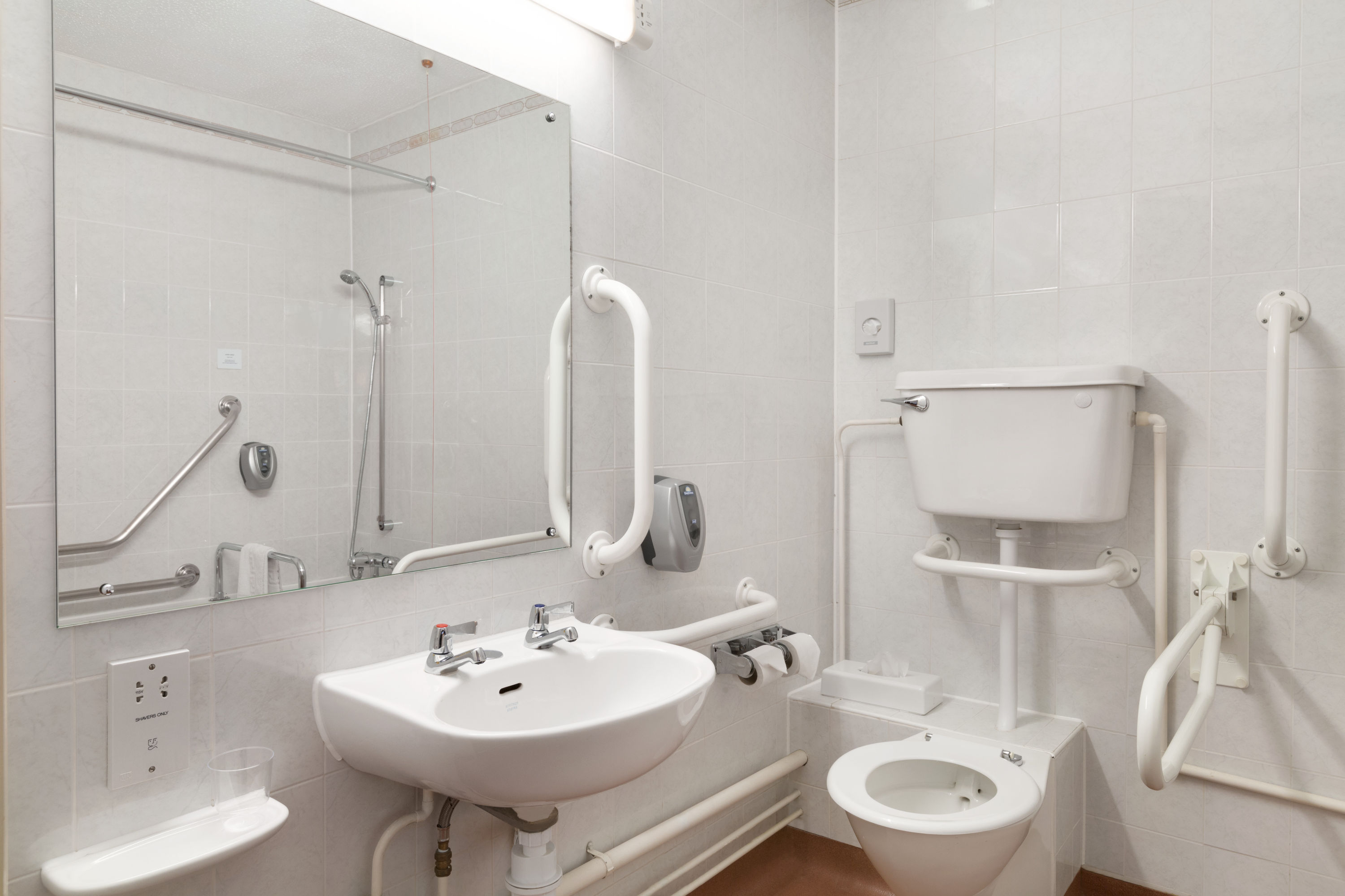 Guest room bath at the Days Inn by Wyndham Southampton Rownhams in Southampton, Other than US/Canada