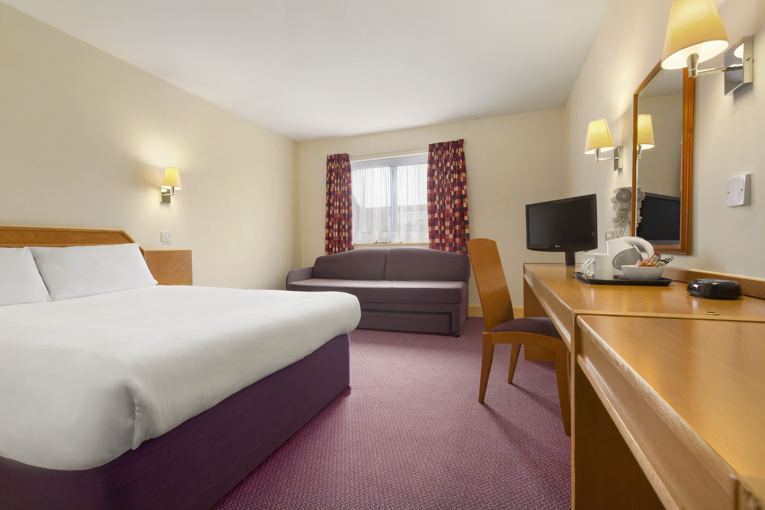Guest room at the Days Inn by Wyndham Sevenoaks Clacket Lane in Westerham, Other than US/Canada