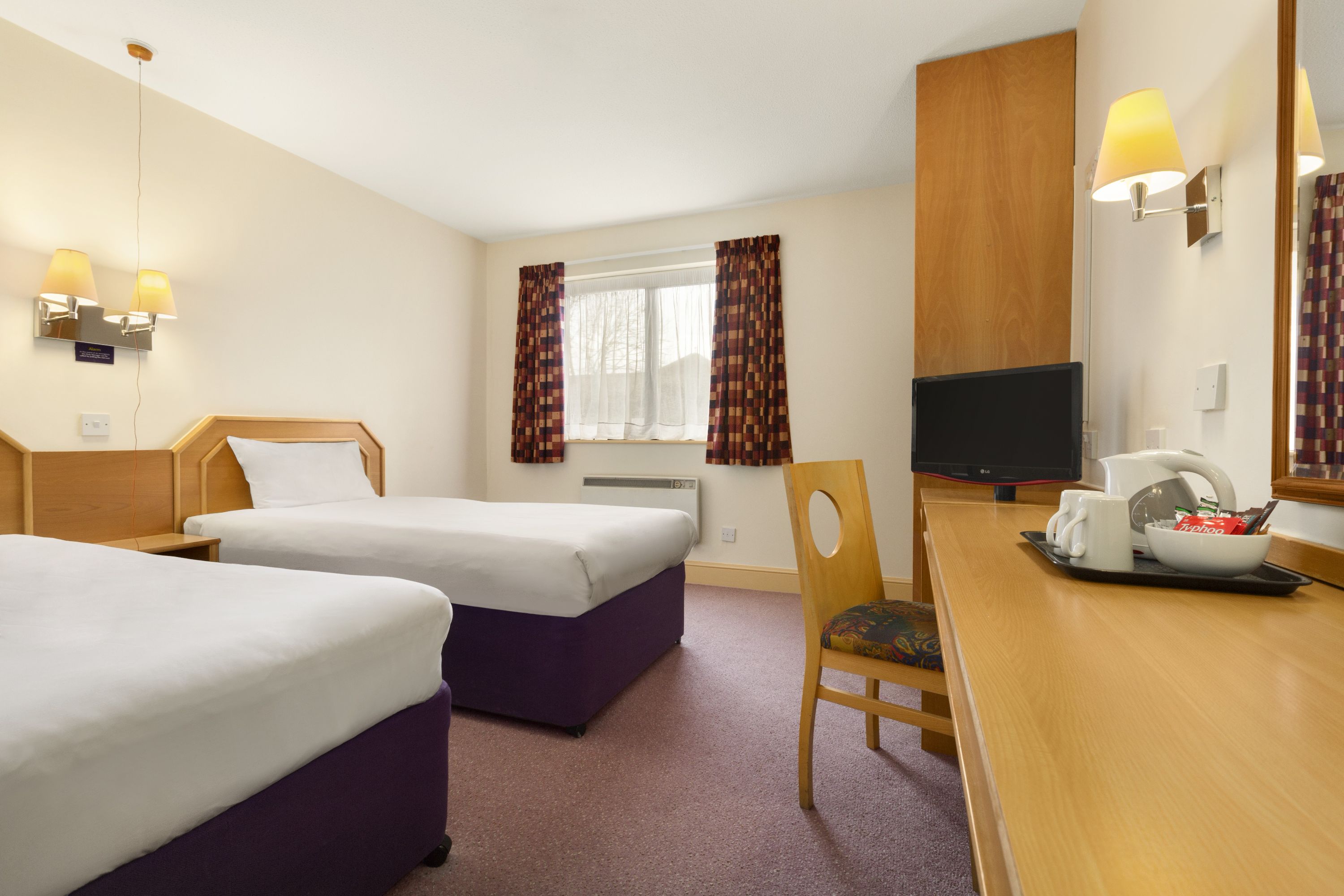 Guest room at the Days Inn by Wyndham Sevenoaks Clacket Lane in Westerham, Other than US/Canada