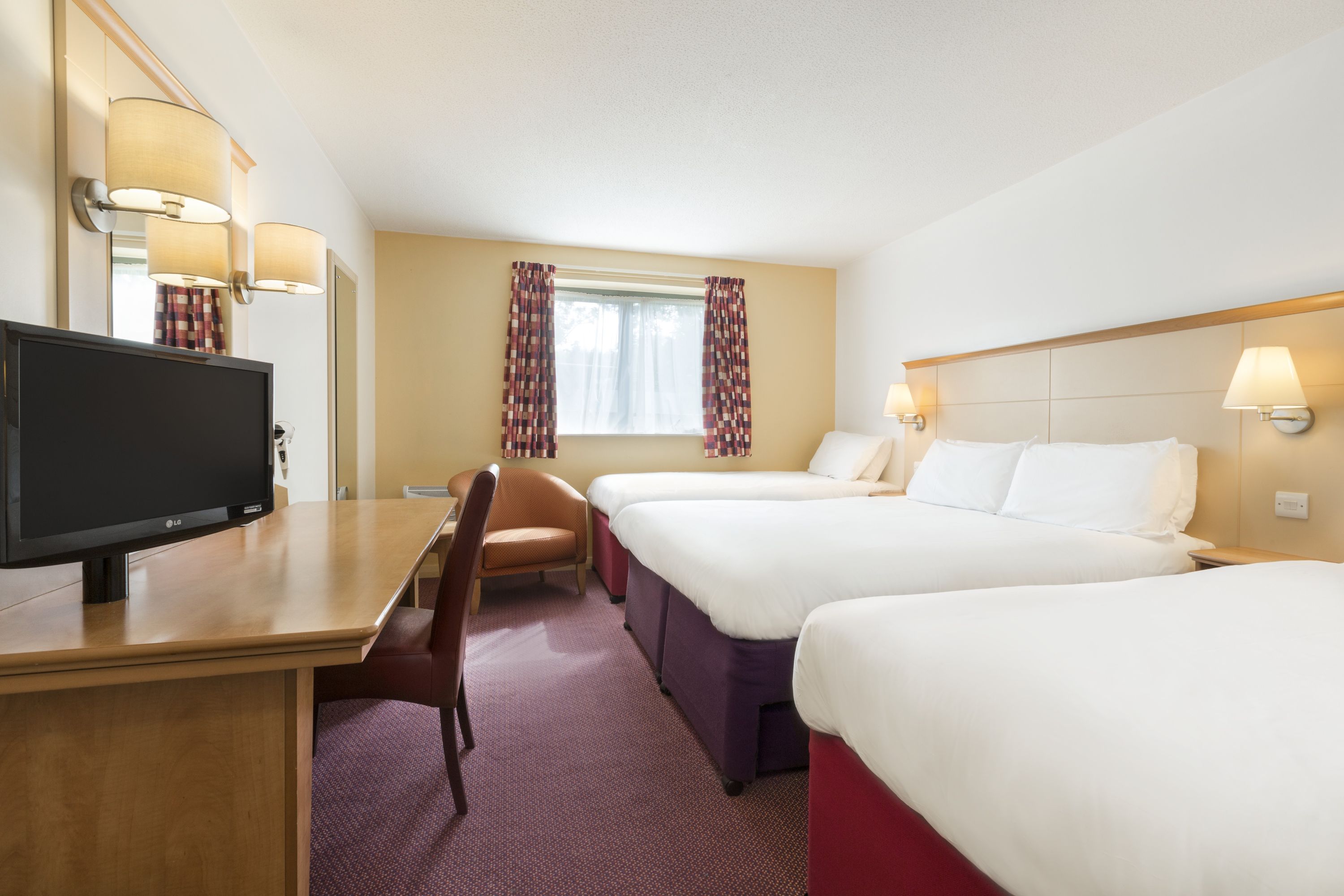 Guest room at the Days Inn by Wyndham Winchester M3 in Winchester, Other than US/Canada