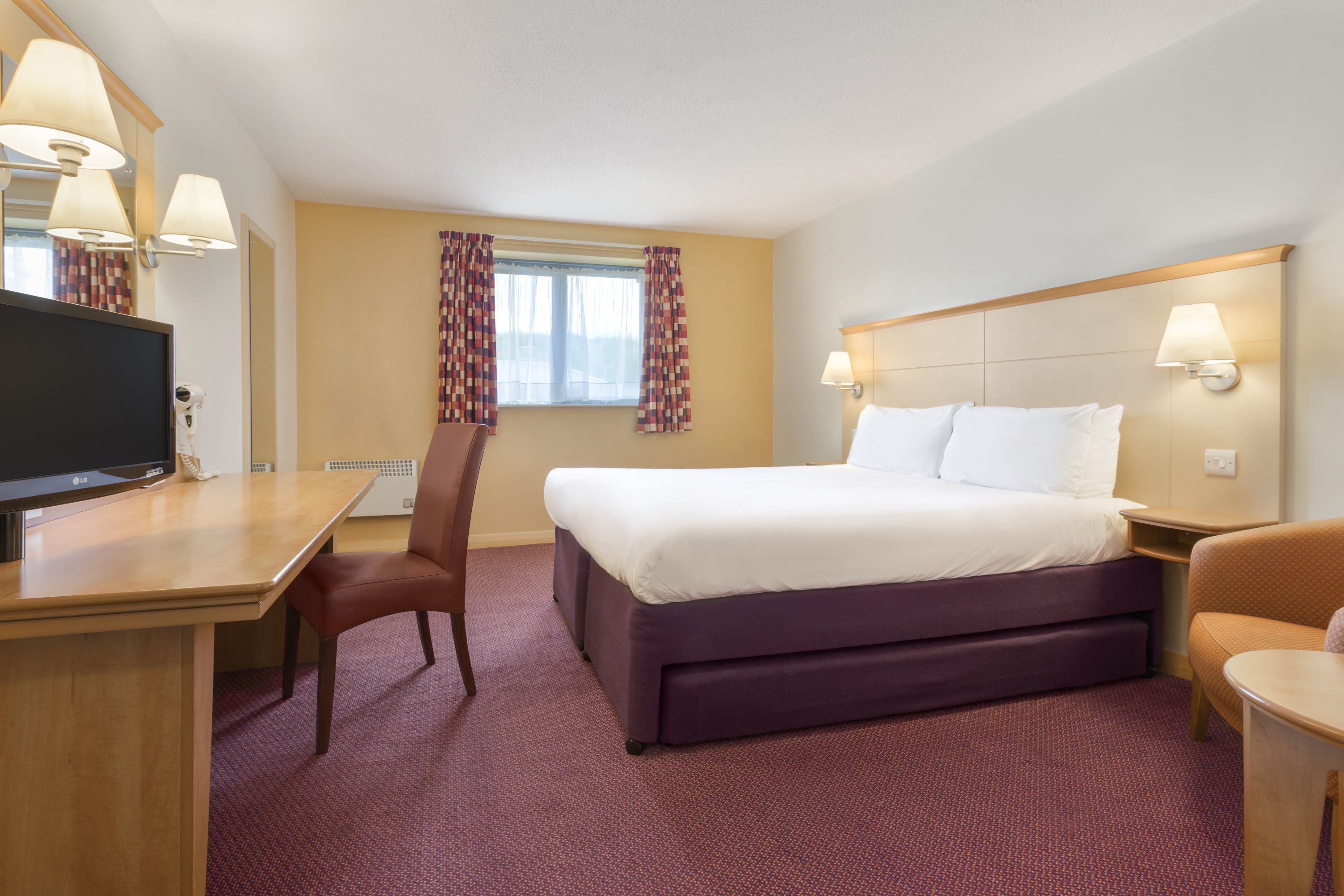Guest room at the Days Inn by Wyndham Winchester M3 in Winchester, Other than US/Canada
