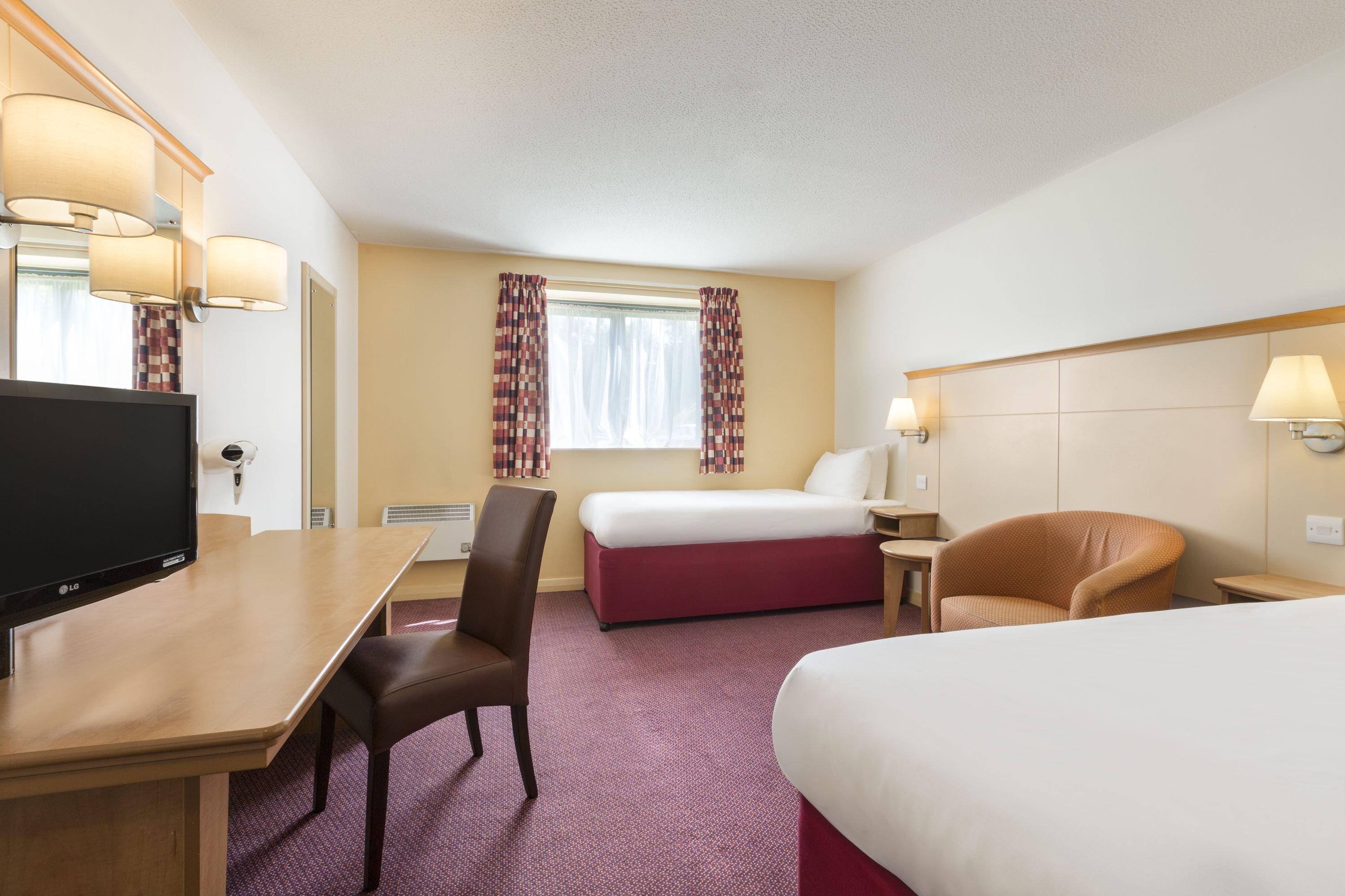 Guest room at the Days Inn by Wyndham Winchester M3 in Winchester, Other than US/Canada
