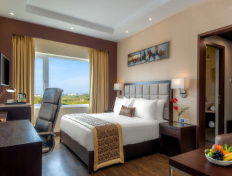 Guest room at the Days Hotel by Wyndham Chennai OMR in Chennai, Other than US/Canada
