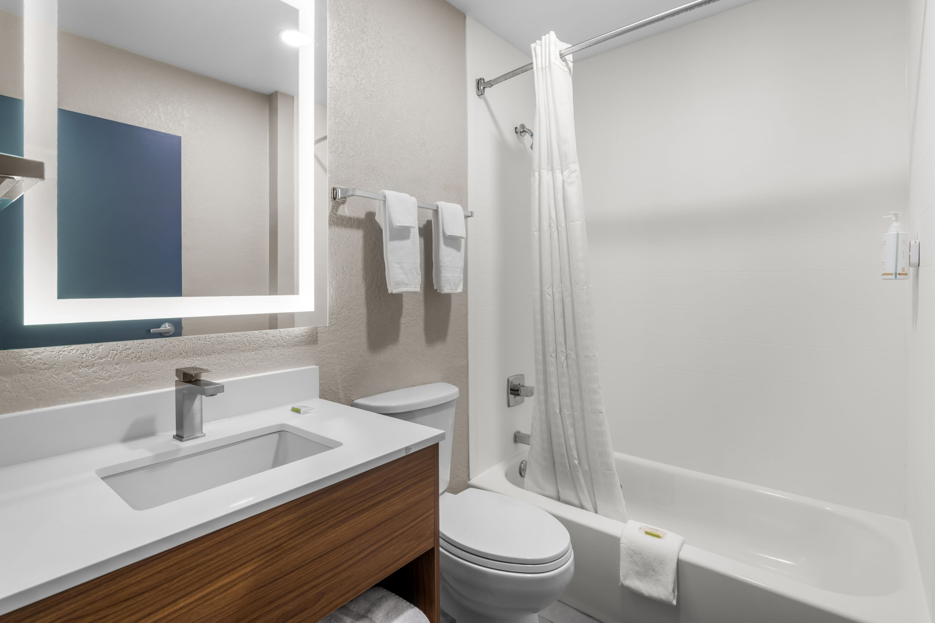 Guest room bath at the Days Inn & Suites by Wyndham Brandon Amphitheater in Brandon, Mississippi