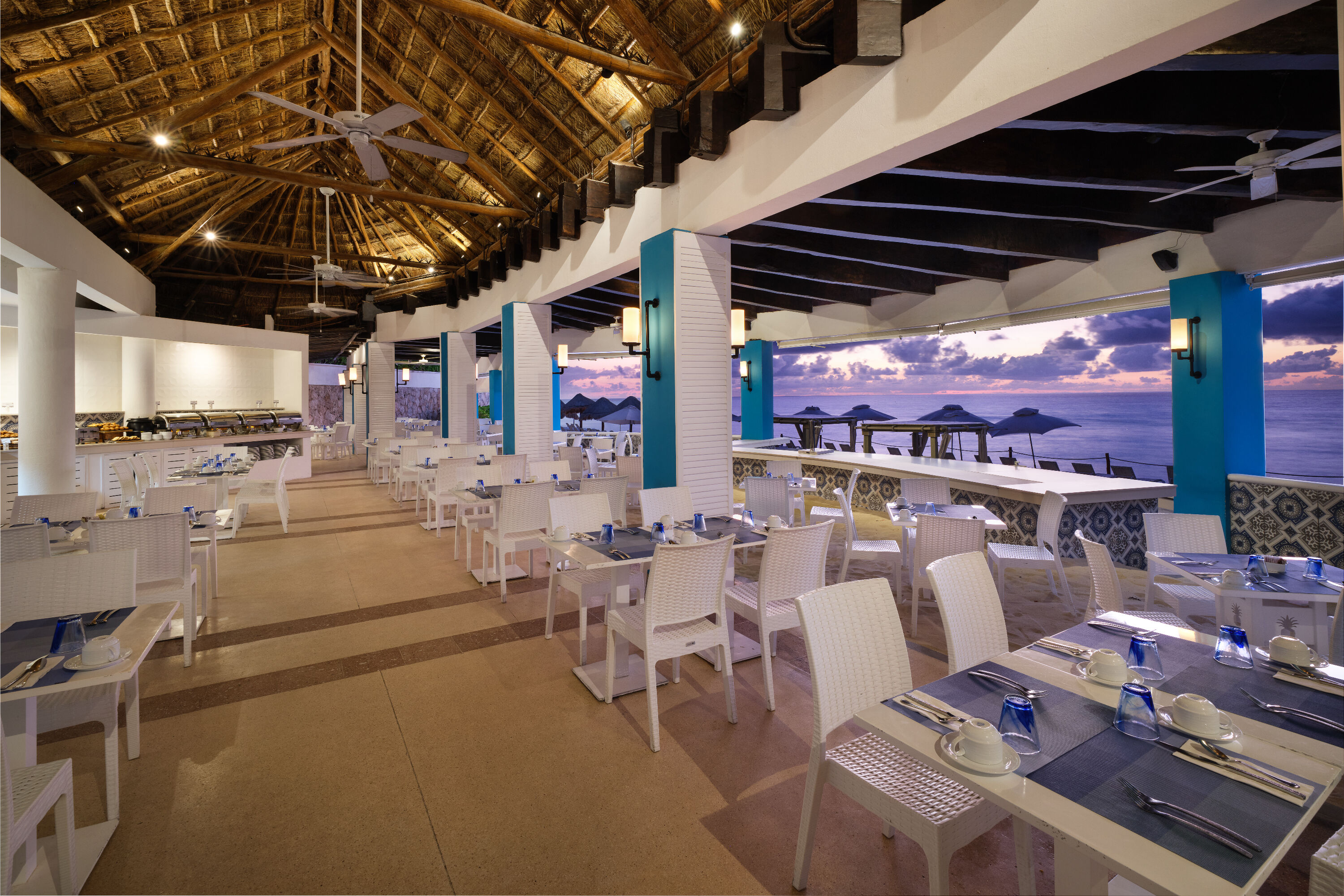 Wyndham Grand Cancun All Inclusive Resort & Villas restaurant breakfast area with seating in Cancun, Other than US/Canada