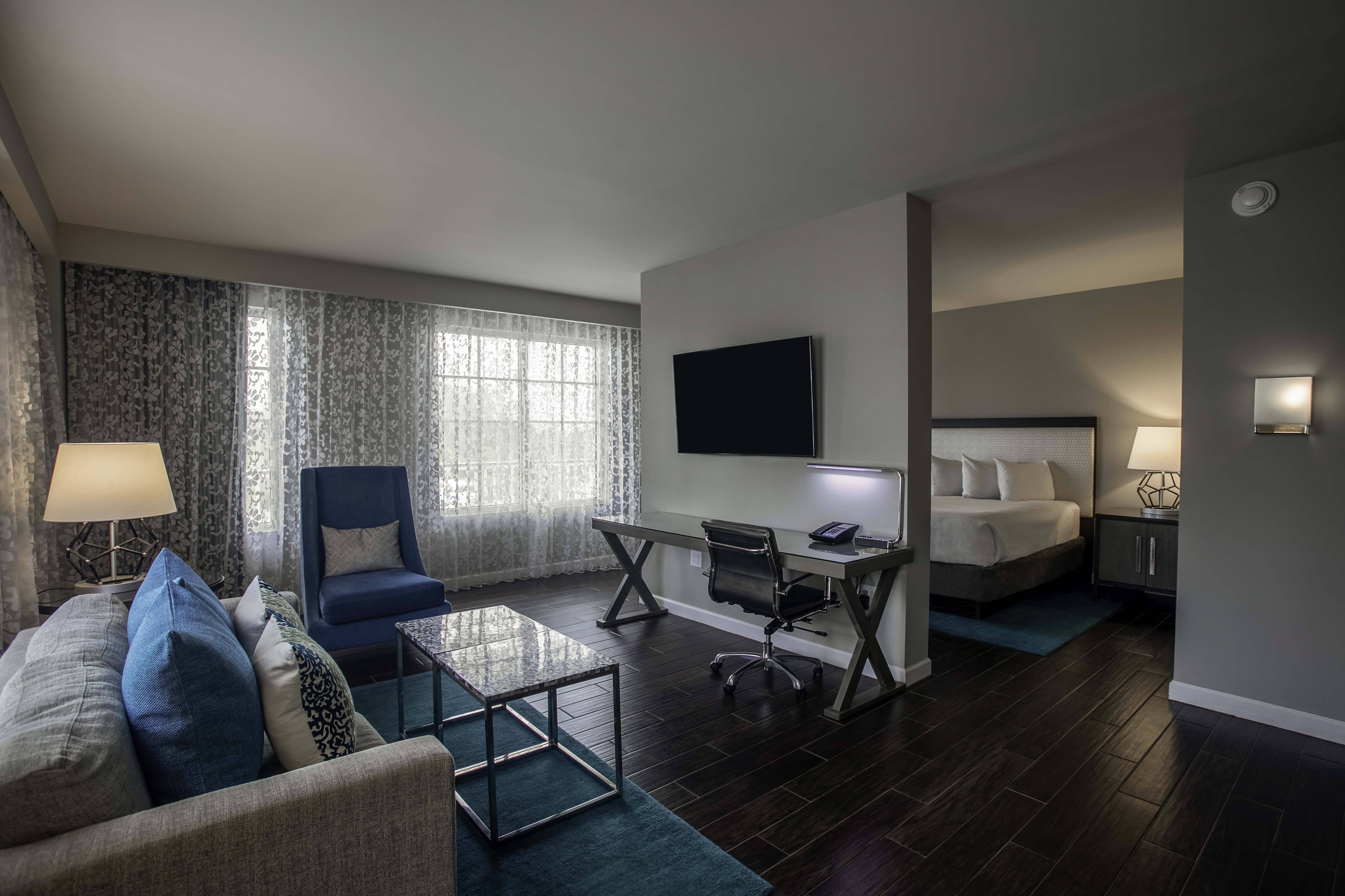 Guest room at the Wyndham Grand Jupiter at Harbourside Place in Jupiter, Florida