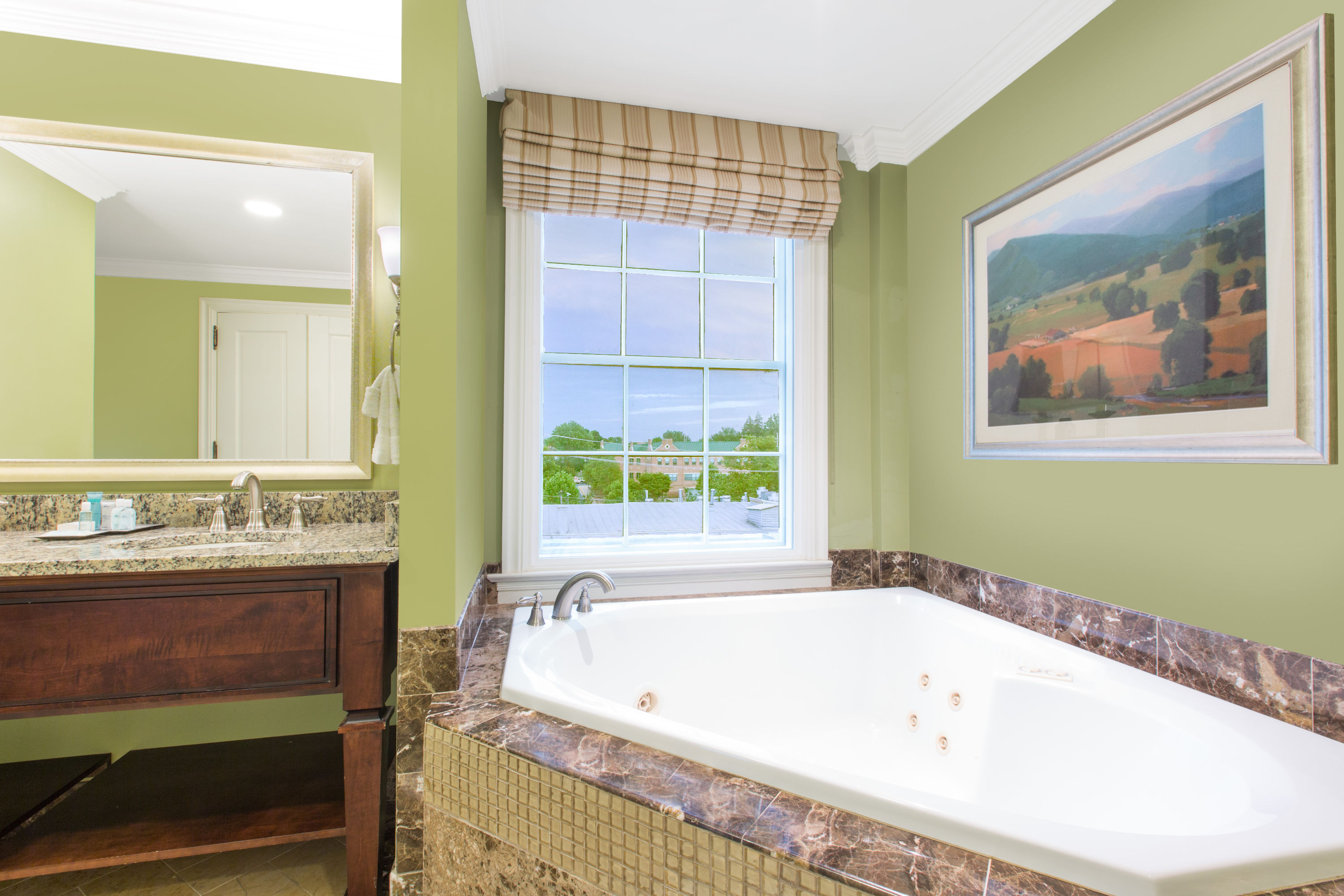 Guest room at the The George Washington, a Wyndham Grand Hotel in Winchester, Virginia