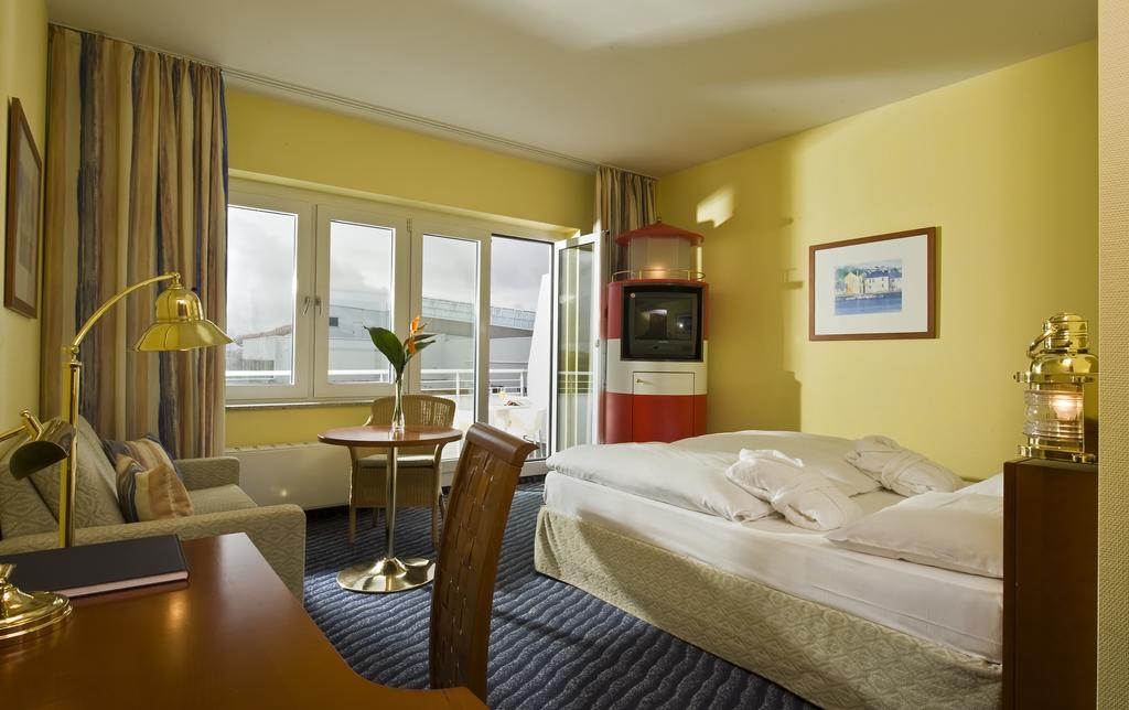 Guest room at the Wyndham Stralsund HanseDom in Stralsund, Other than US/Canada