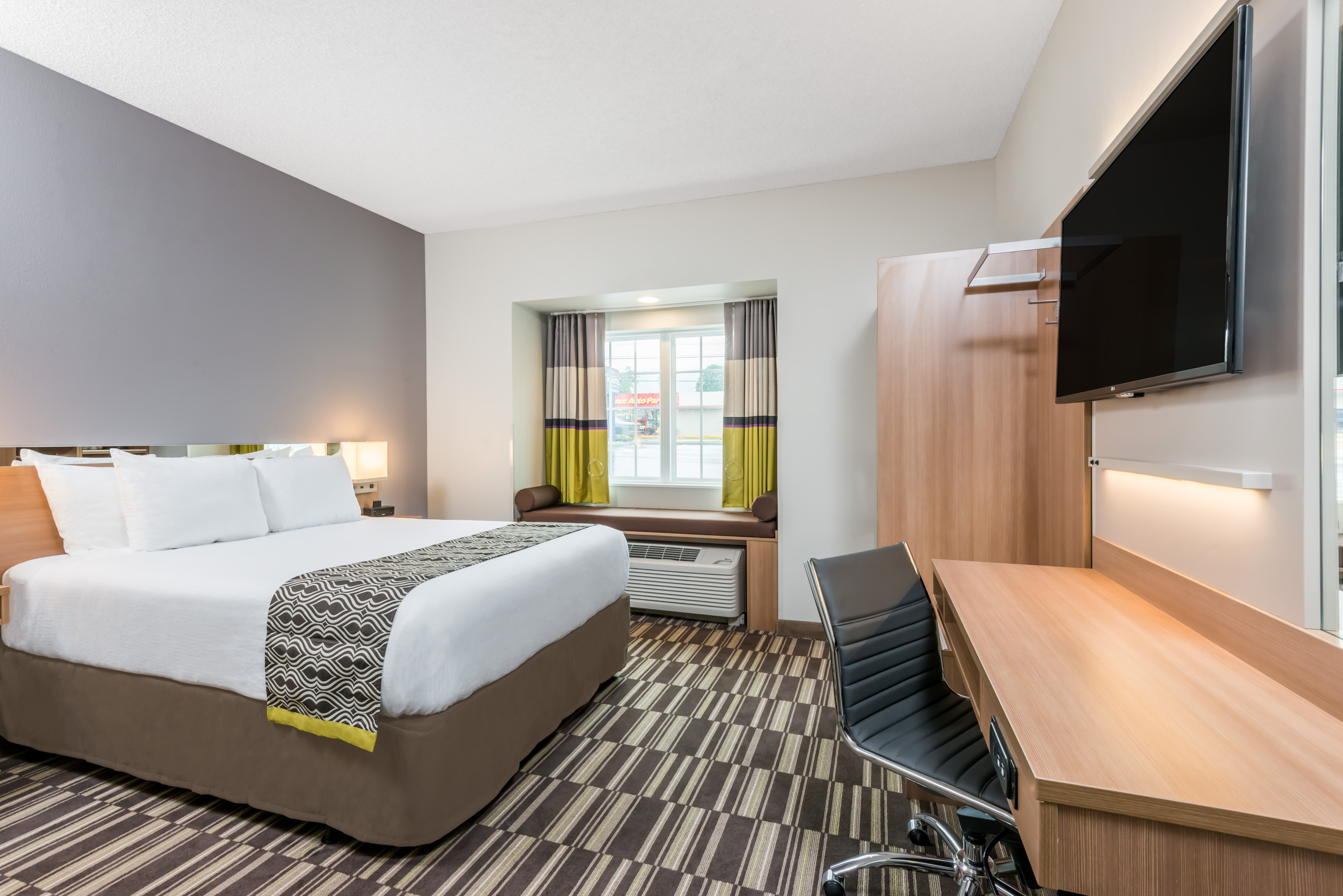 Guest room at the Microtel Inn & Suites by Wyndham New Martinsville in New Martinsville, West Virginia