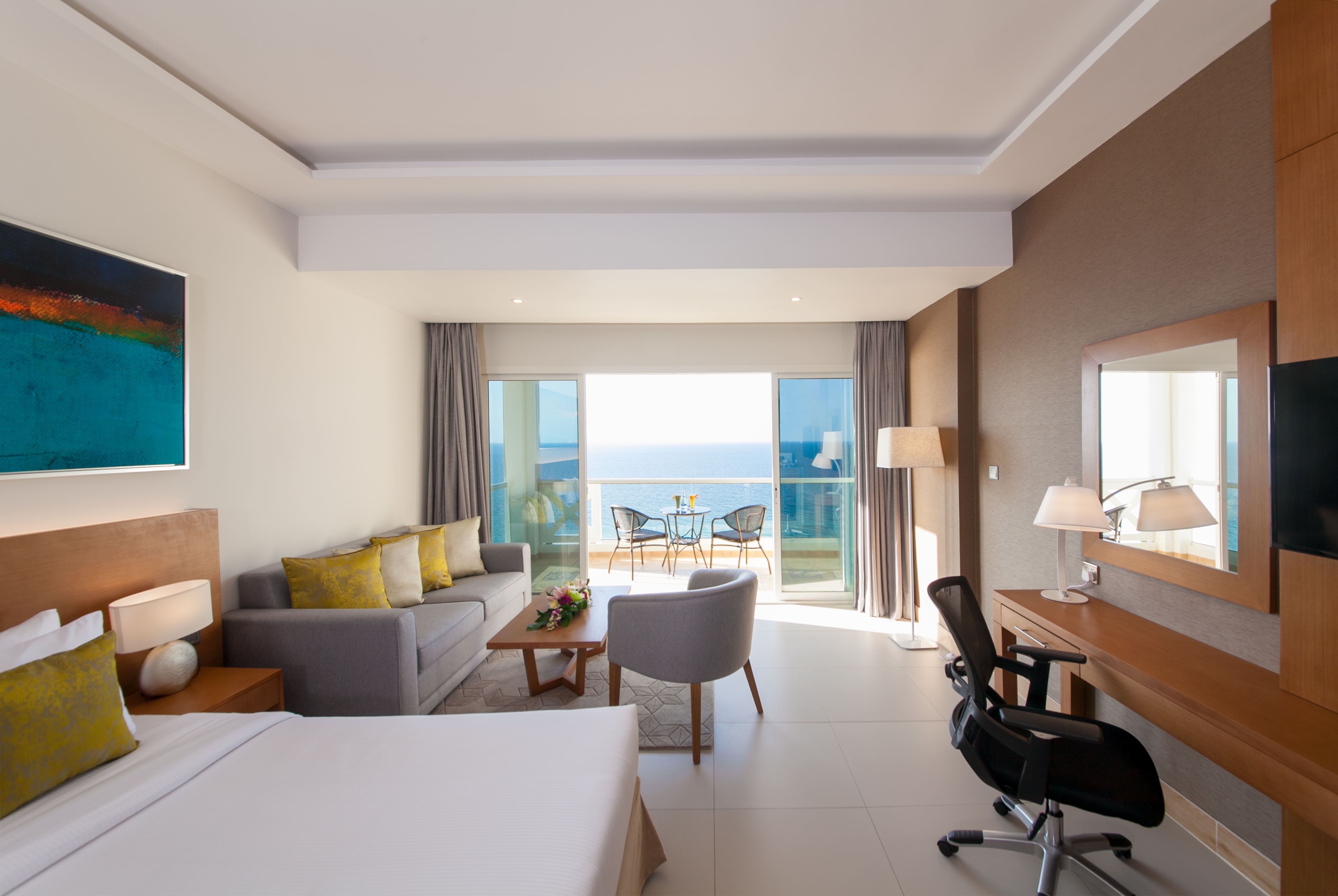 Guest room at the Ramada by Wyndham Beach Hotel Ajman in Ajman, Other than US/Canada