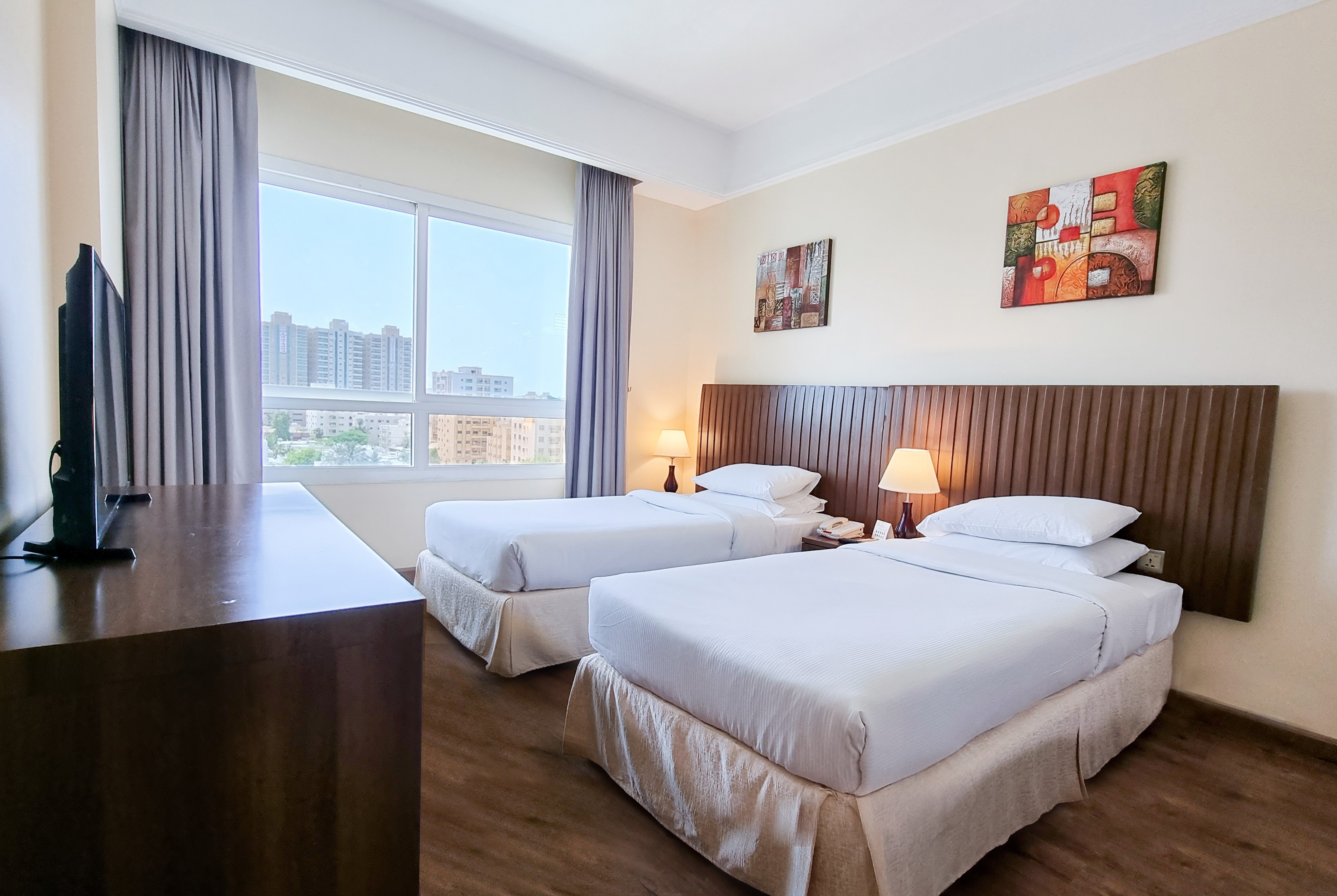Guest room at the Ramada by Wyndham Beach Hotel Ajman in Ajman, Other than US/Canada
