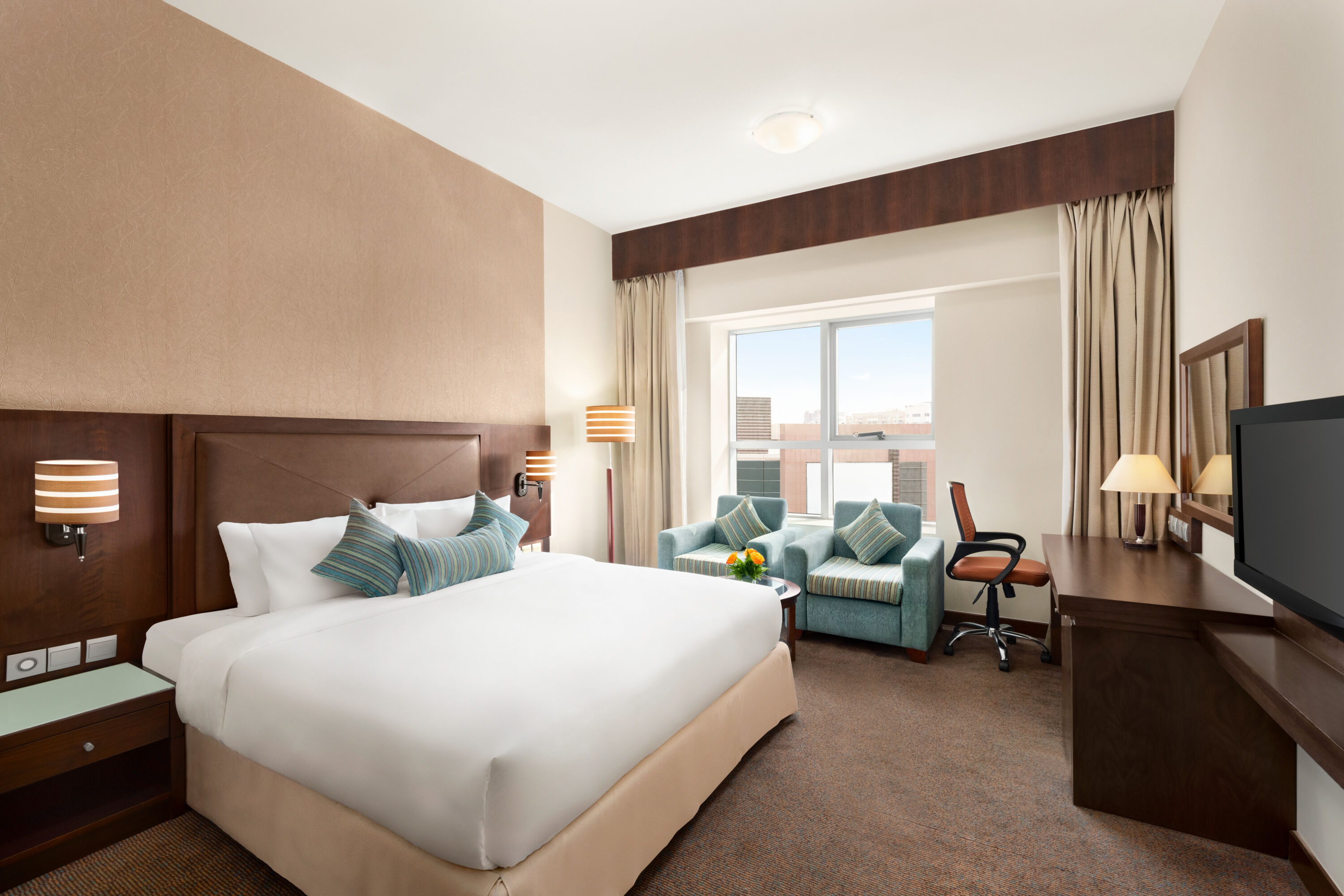 Guest room at the Ramada by Wyndham Dubai Deira in Dubai, Other than US/Canada