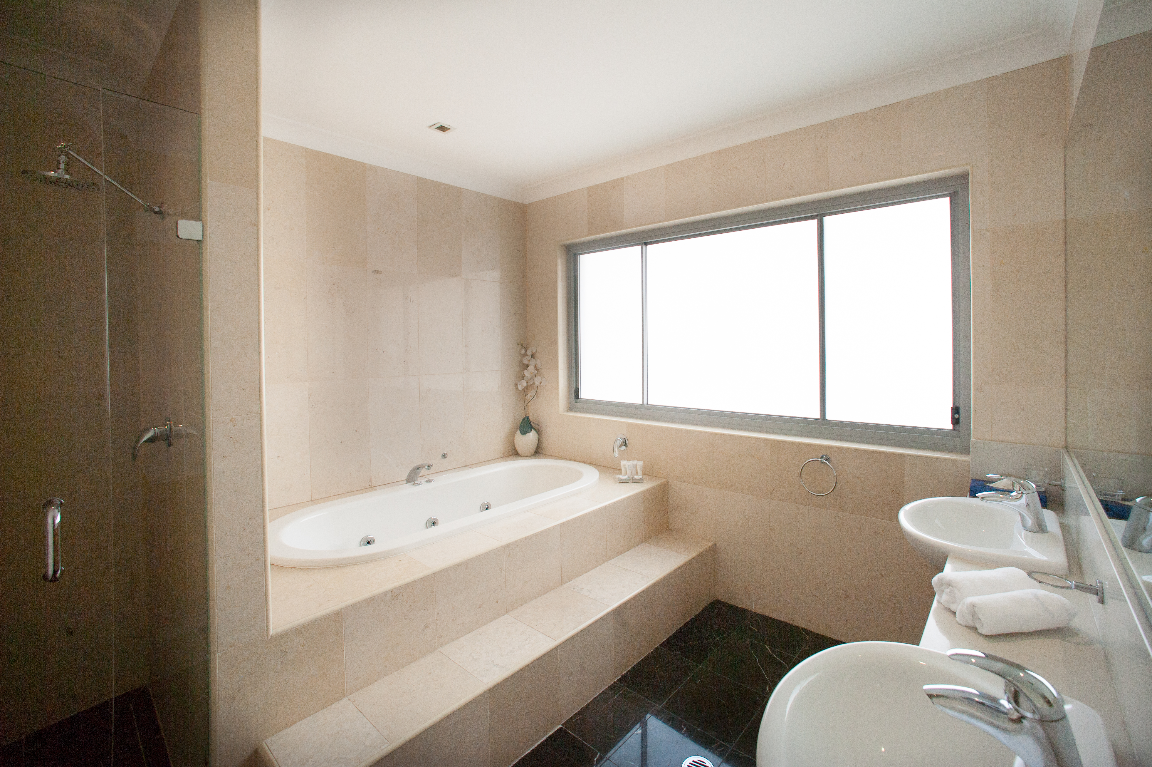 Guest room at the Ramada Hotel & Suites by Wyndham Sydney Cabramatta in Cabramatta, Other than US/Canada