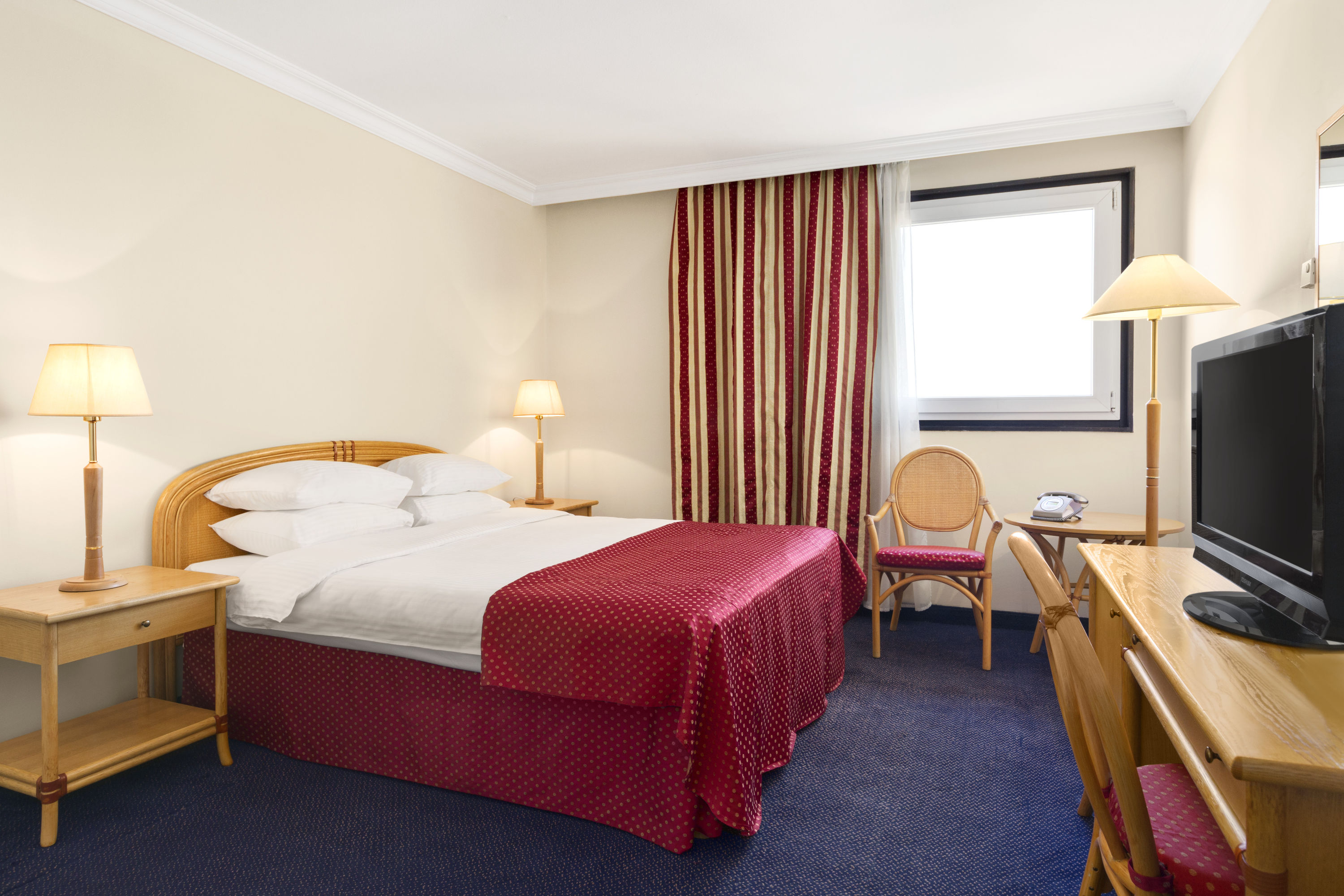Guest room at the Ramada by Wyndham Sofia City Center in Sofia, Other than US/Canada