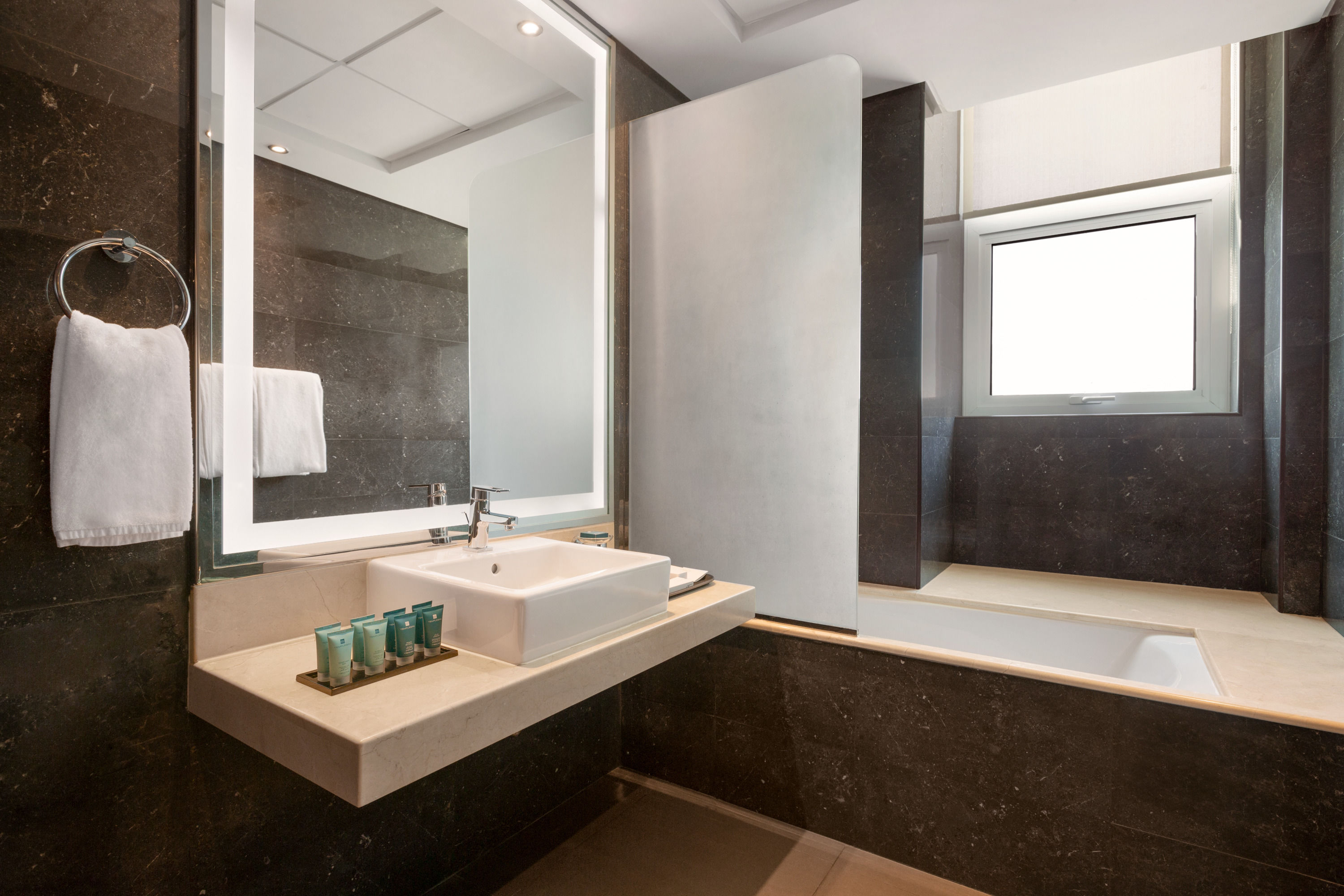 Guest room bath at the Ramada Resort by Wyndham Manama Seef in Manama, Other than US/Canada