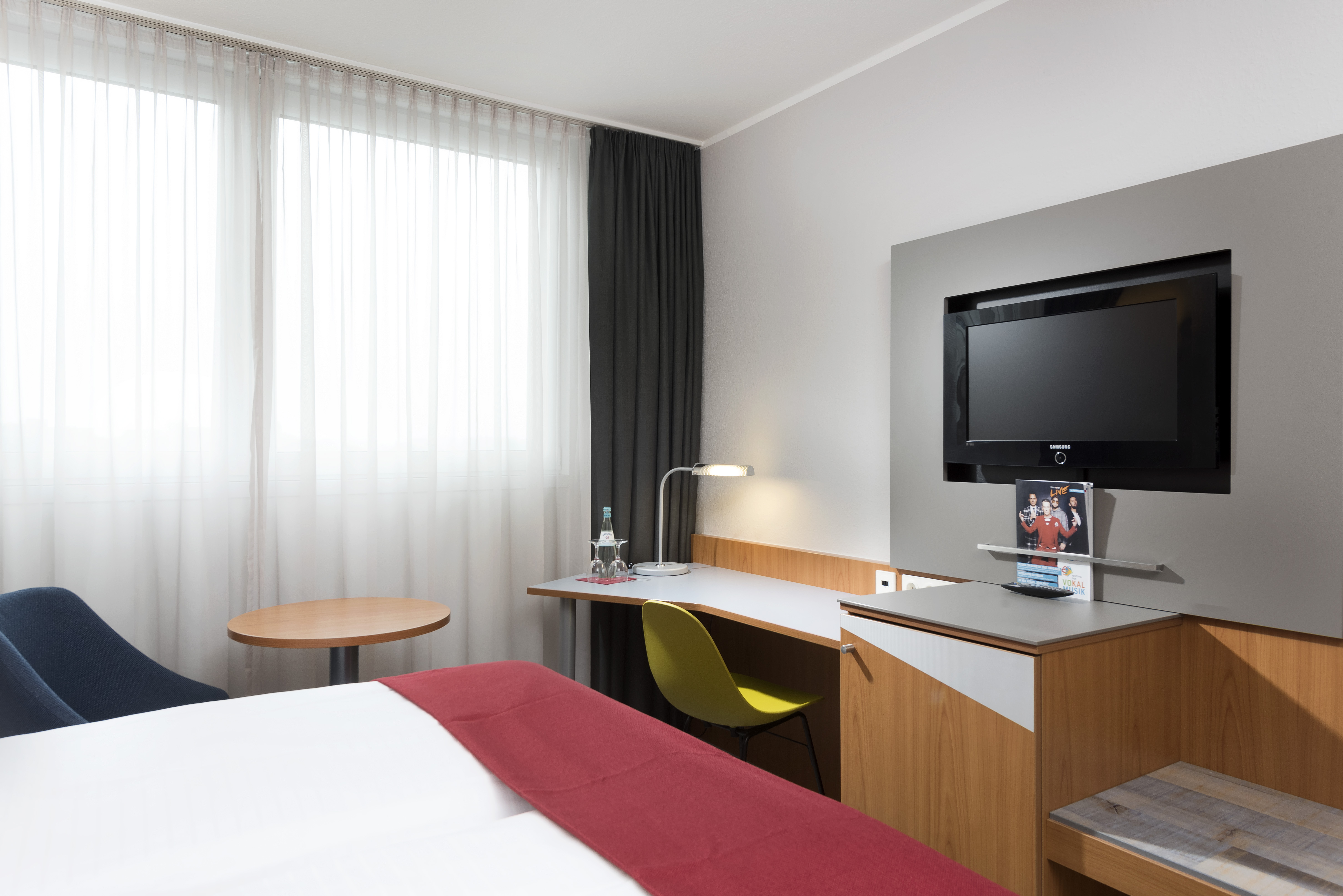 Guest room at the Ramada by Wyndham Hannover in Hannover, Other than US/Canada