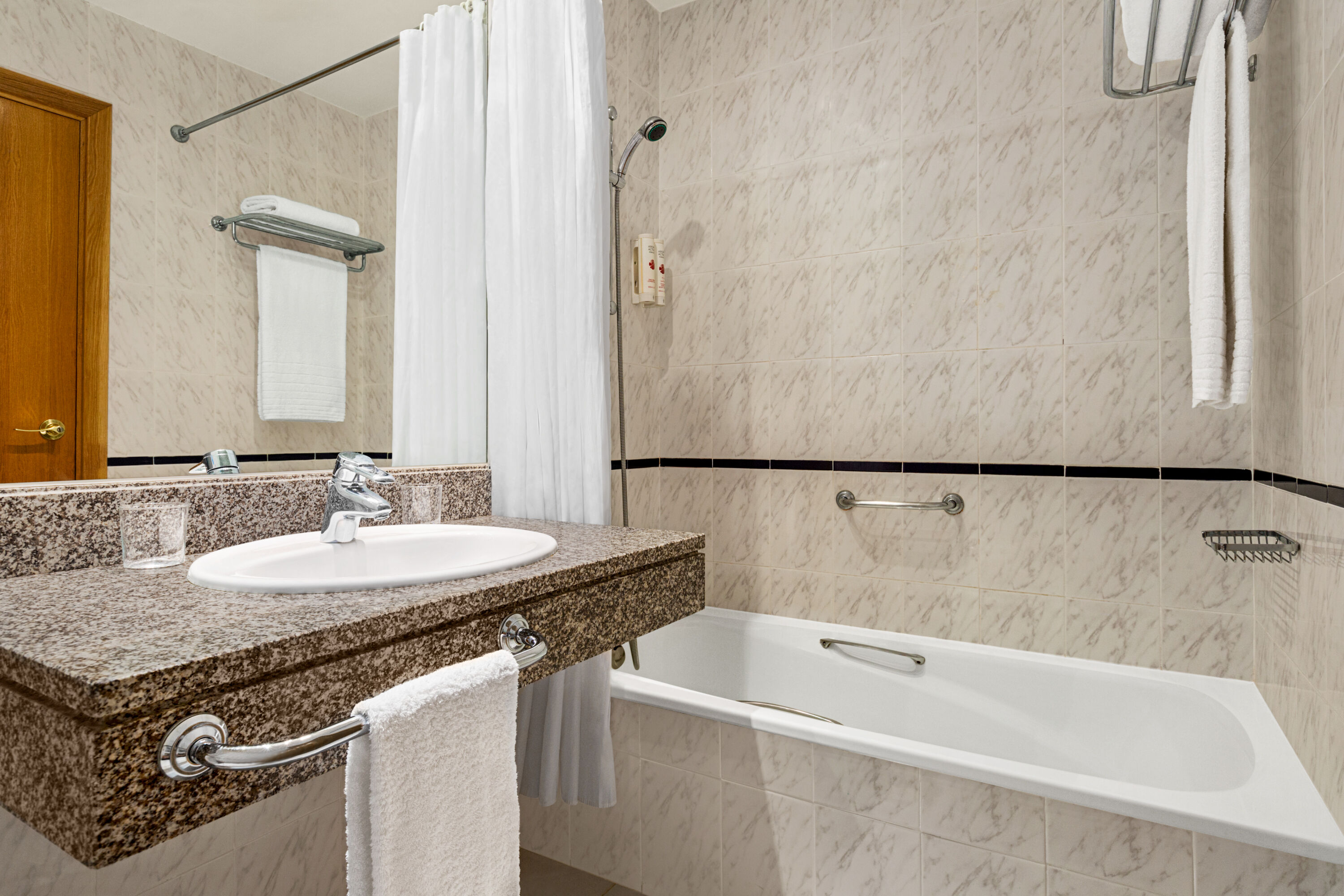 Guest room bath at the Ramada by Wyndham Madrid Tres Cantos in Tres Cantos, Other than US/Canada