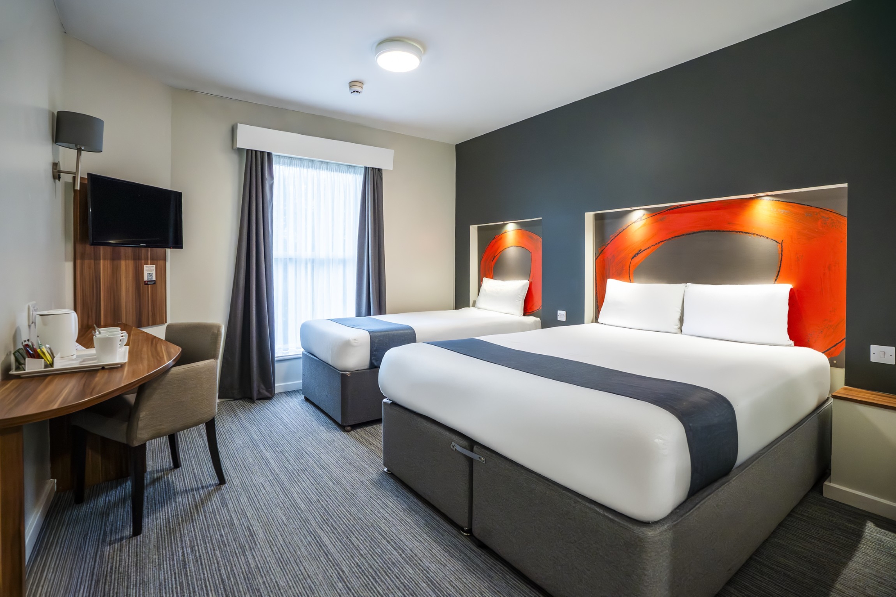 Guest room at the Ramada by Wyndham London Stansted Airport in Bishops Stortford, Other than US/Canada