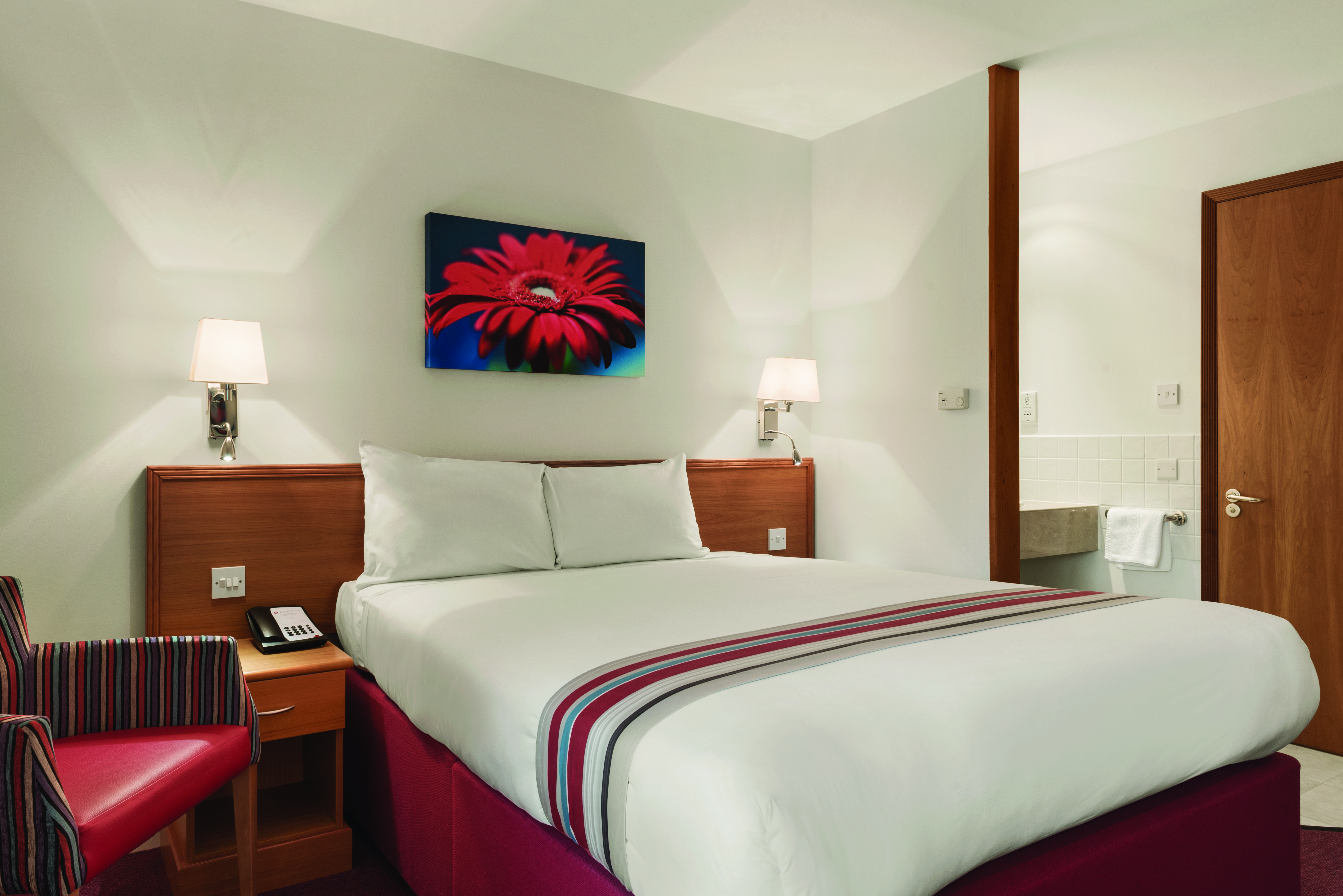 Guest room at the Ramada by Wyndham Cambridge in Cambridge, Other than US/Canada