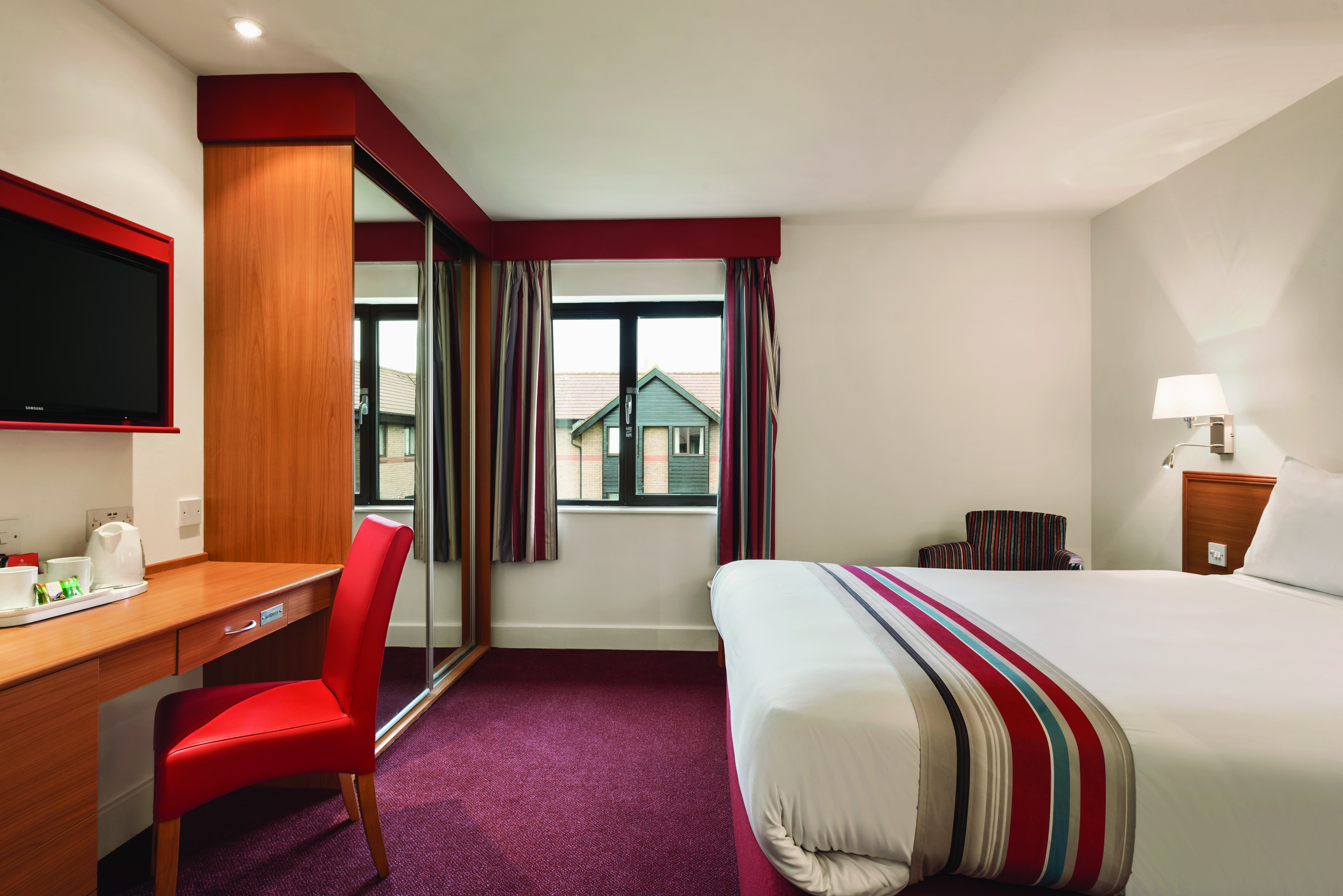 Guest room at the Ramada by Wyndham Cambridge in Cambridge, Other than US/Canada