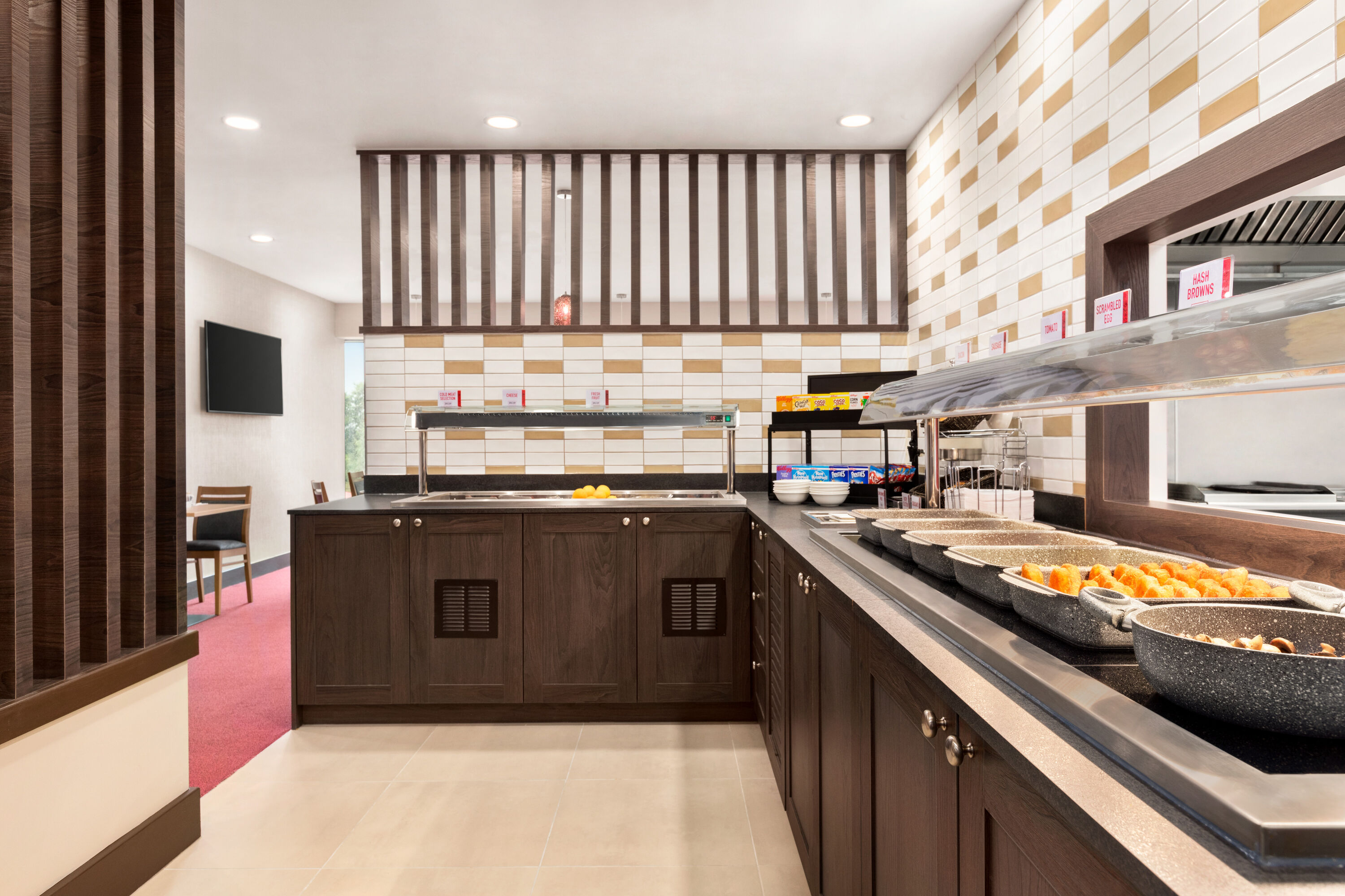 Ramada by Wyndham Cobham restaurant breakfast area with seating in Cobham, Other than US/Canada