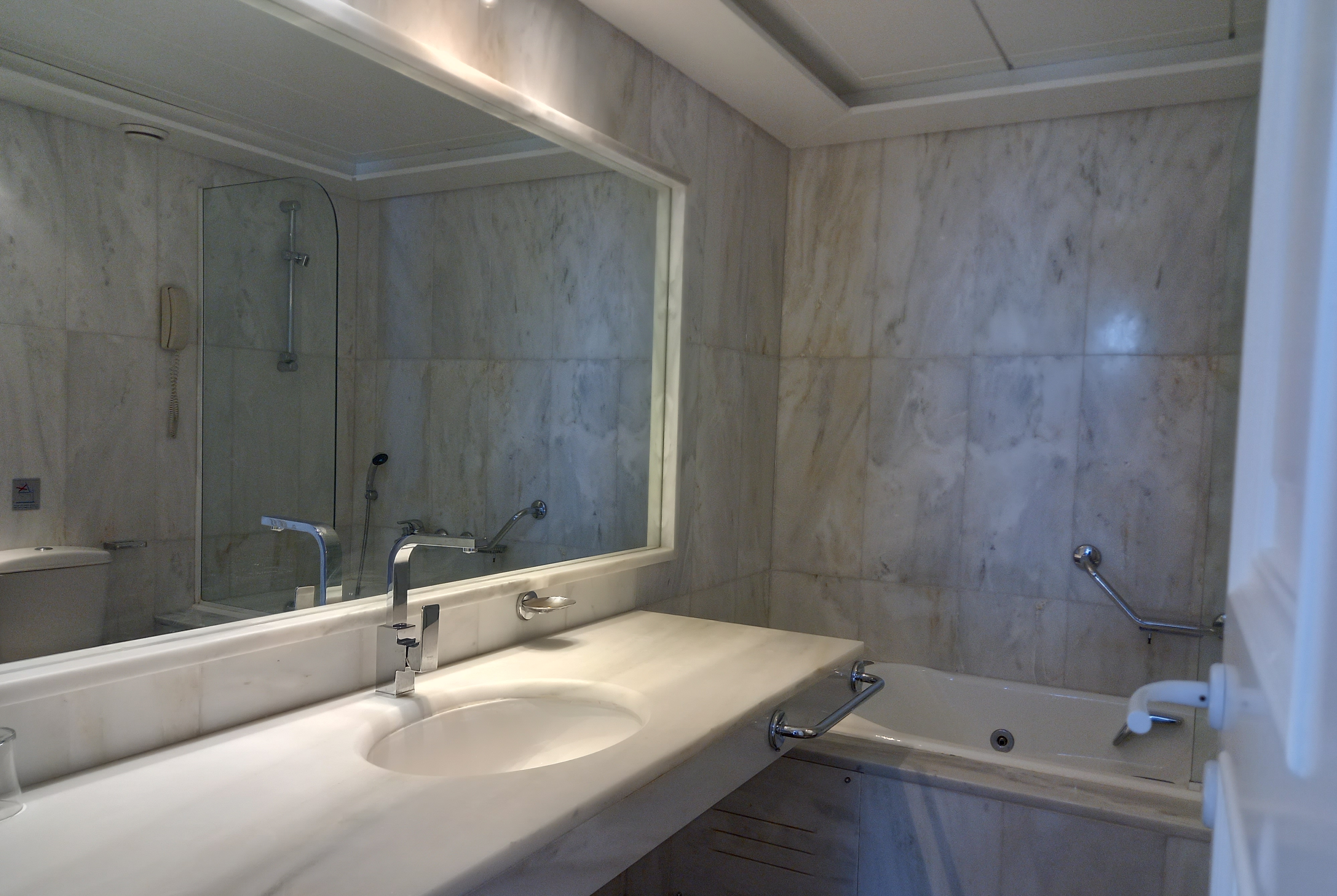 Guest room bath at the Ramada by Wyndham Loutraki Poseidon Resort in Loutraki, Other than US/Canada