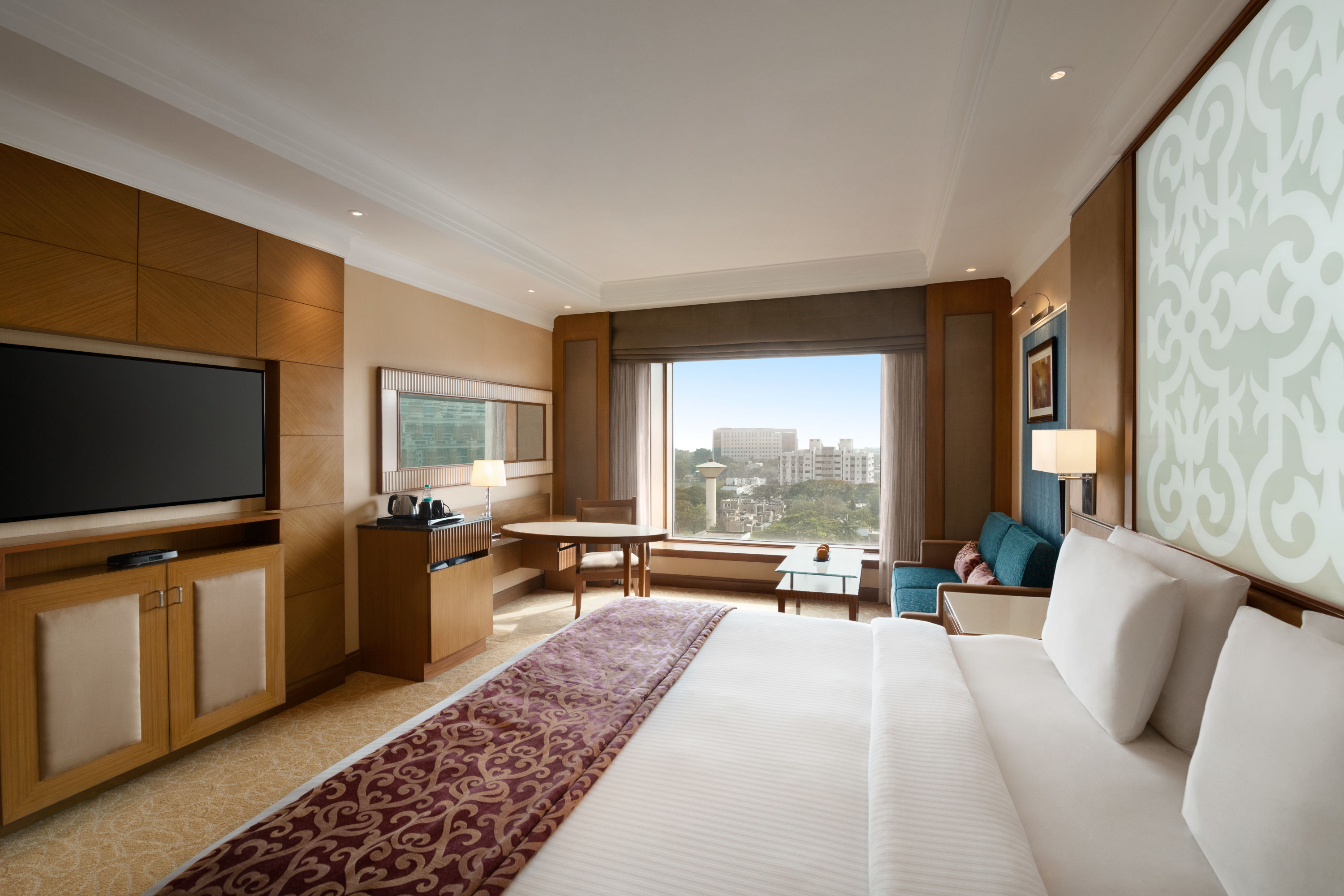 Guest room at the Ramada Plaza by Wyndham Chennai in Chennai, Other than US/Canada