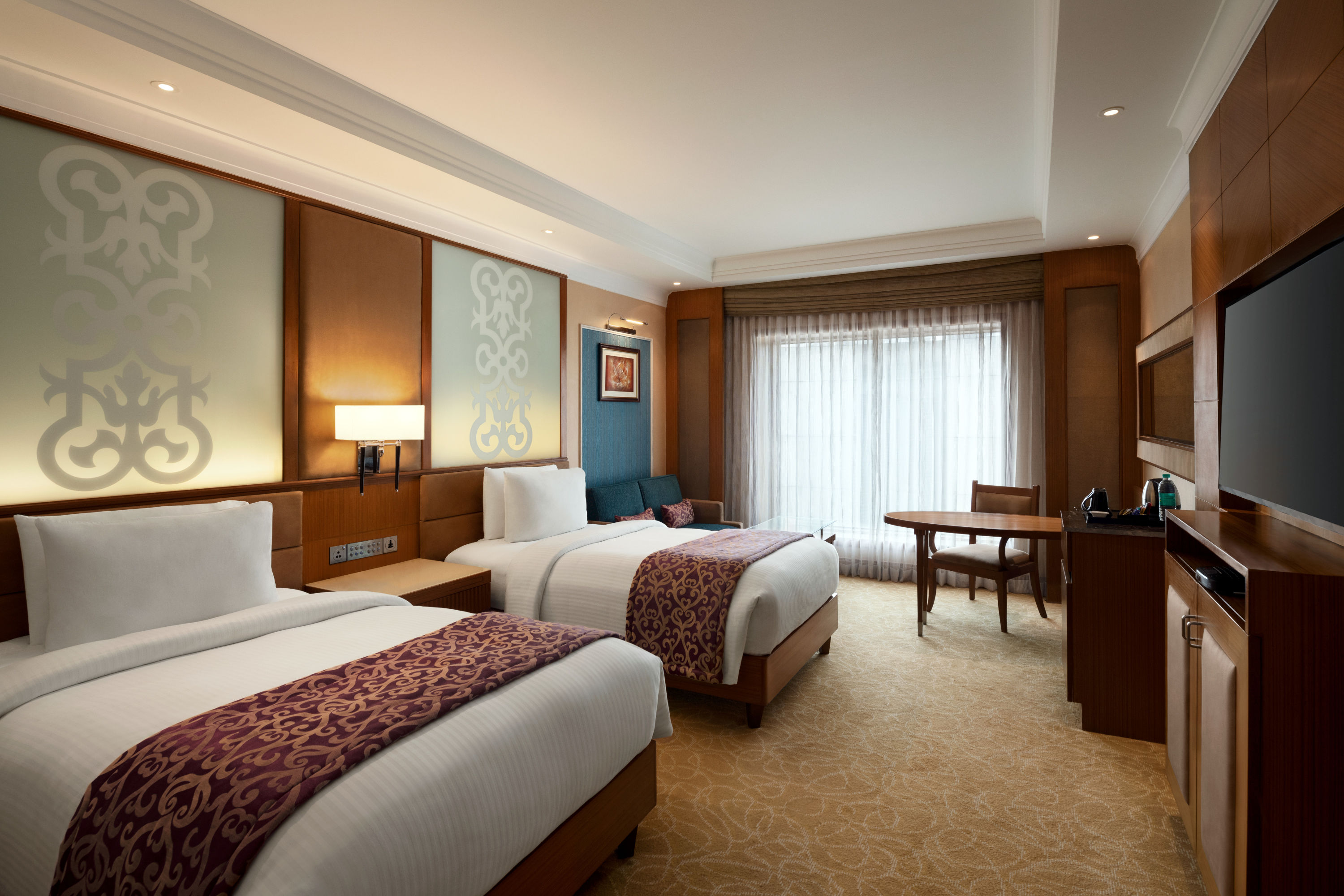 Guest room at the Ramada Plaza by Wyndham Chennai in Chennai, Other than US/Canada