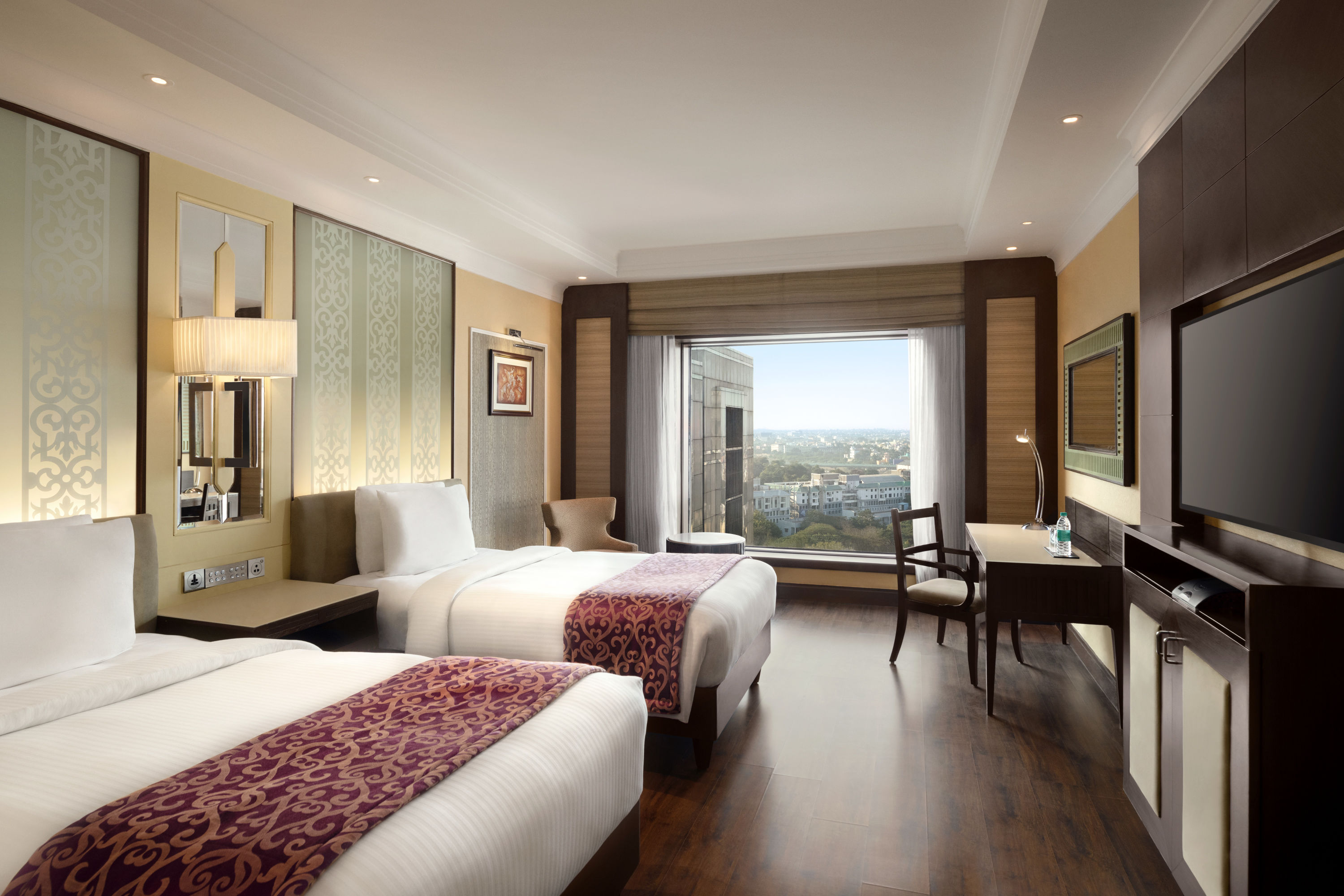 Guest room at the Ramada Plaza by Wyndham Chennai in Chennai, Other than US/Canada