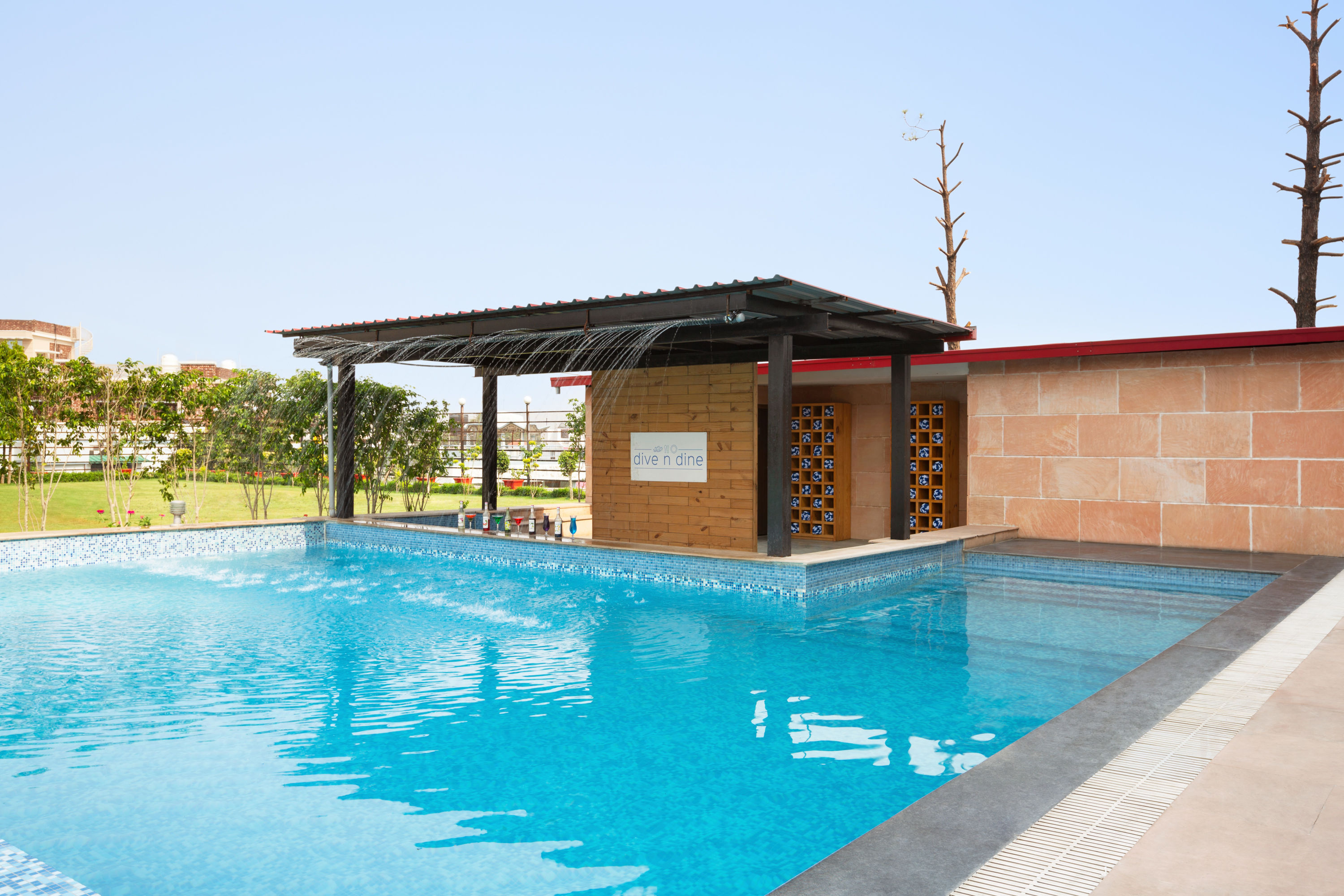 Pool at the Ramada by Wyndham Dehradun Chakrata Road in Dehradun, Other than US/Canada