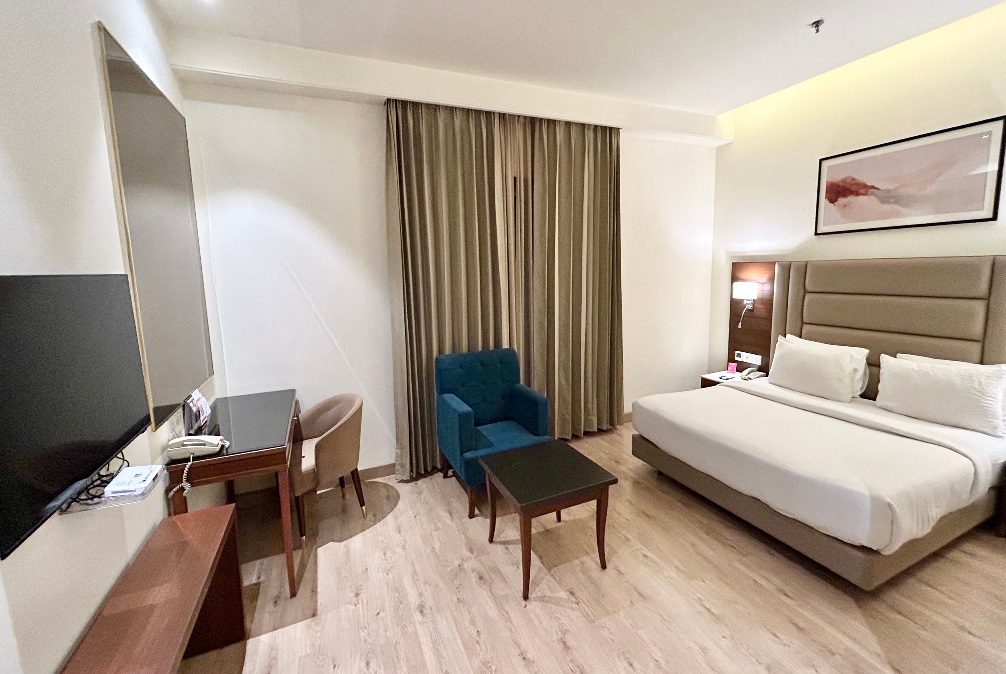Guest room at the Ramada by Wyndham Jalandhar City Centre in Jalandhar, Other than US/Canada