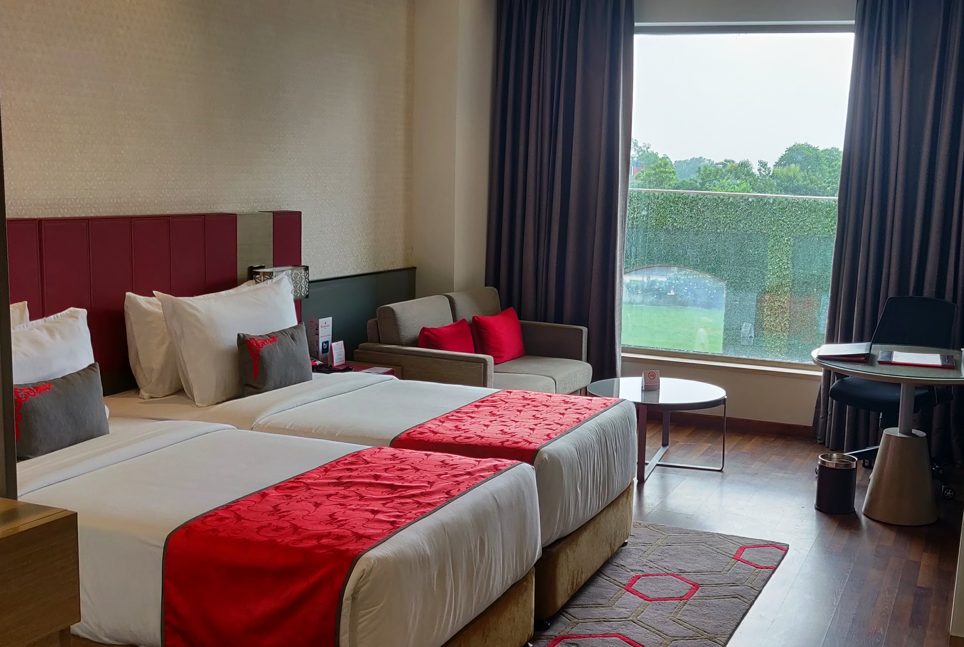 Guest room at the Ramada Plaza by Wyndham Lucknow in Lucknow, Other than US/Canada