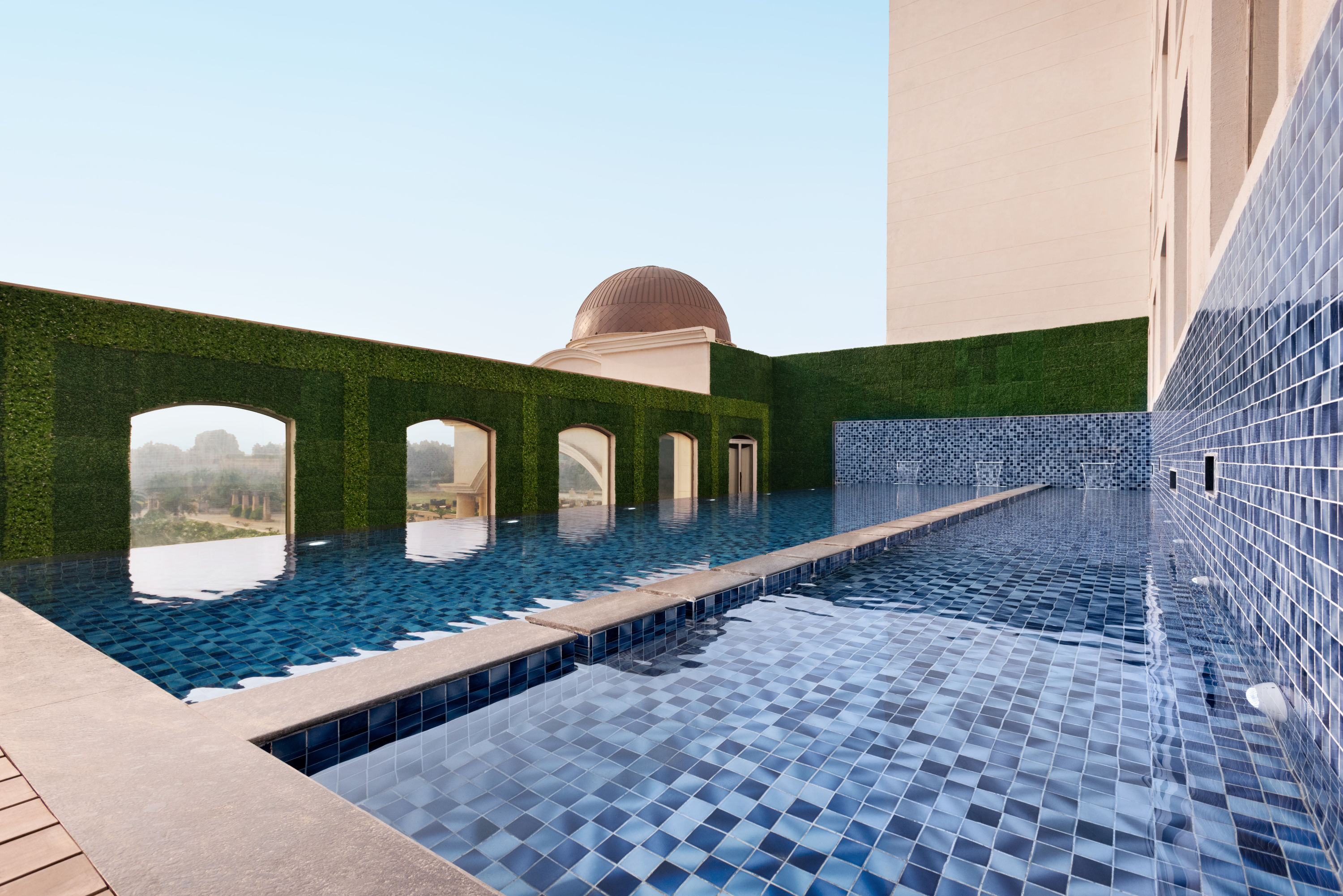 Family pool at the Ramada by Wyndham Lucknow Hotel and Convention Center in Lucknow, Other than US/Canada