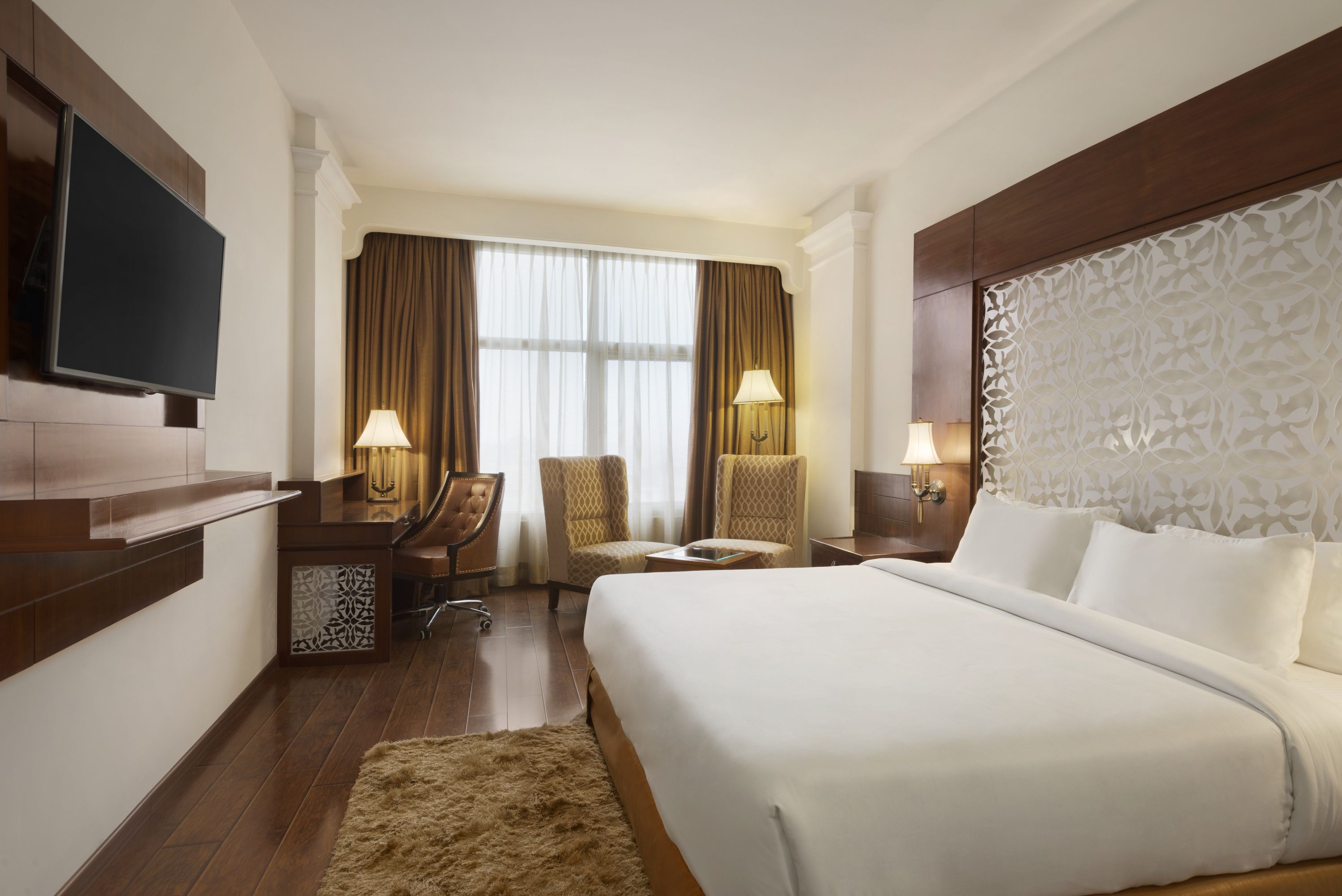 Guest room at the Ramada Plaza by Wyndham Chandigarh Zirakpur in Zirakpur, Other than US/Canada