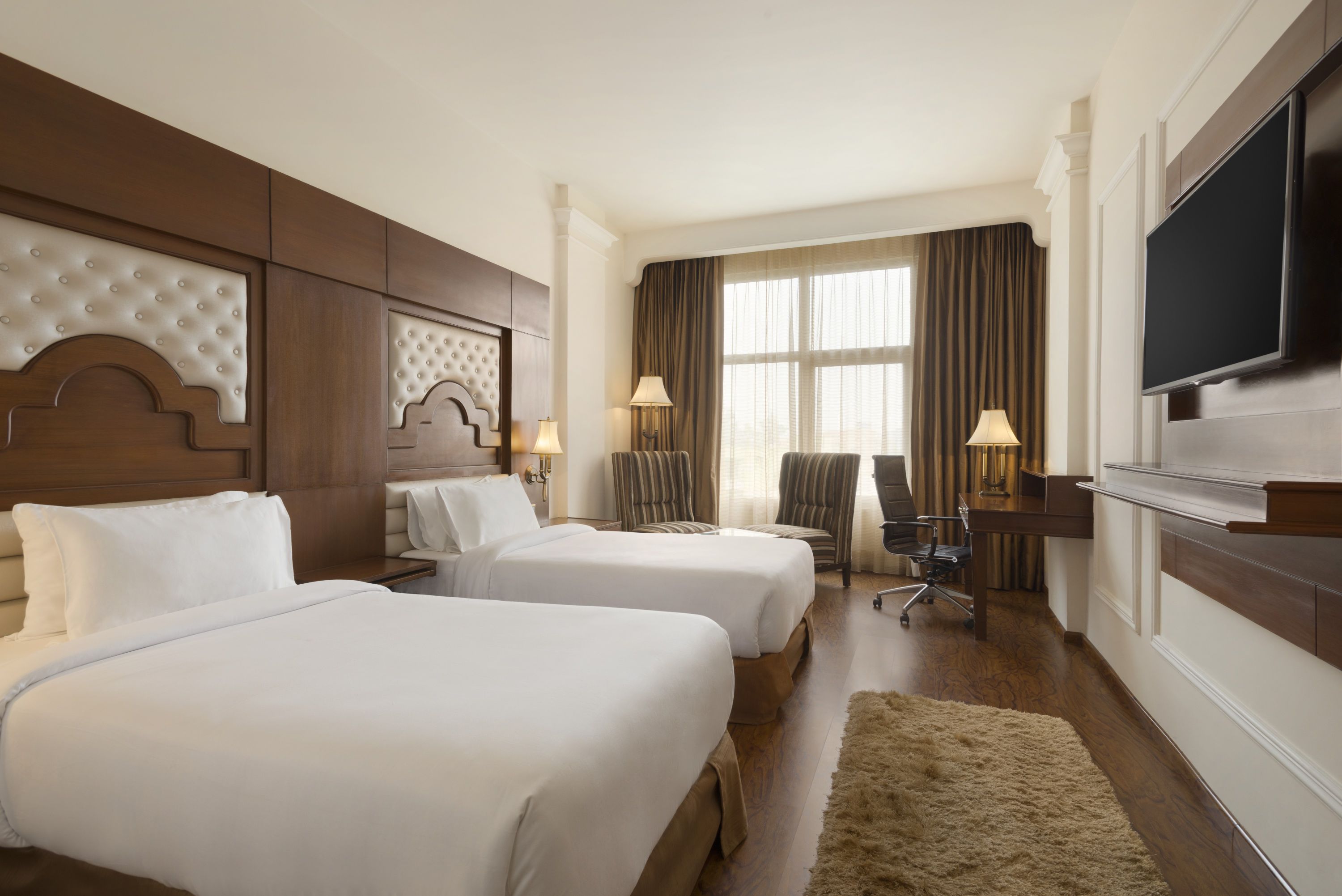 Guest room at the Ramada Plaza by Wyndham Chandigarh Zirakpur in Zirakpur, Other than US/Canada