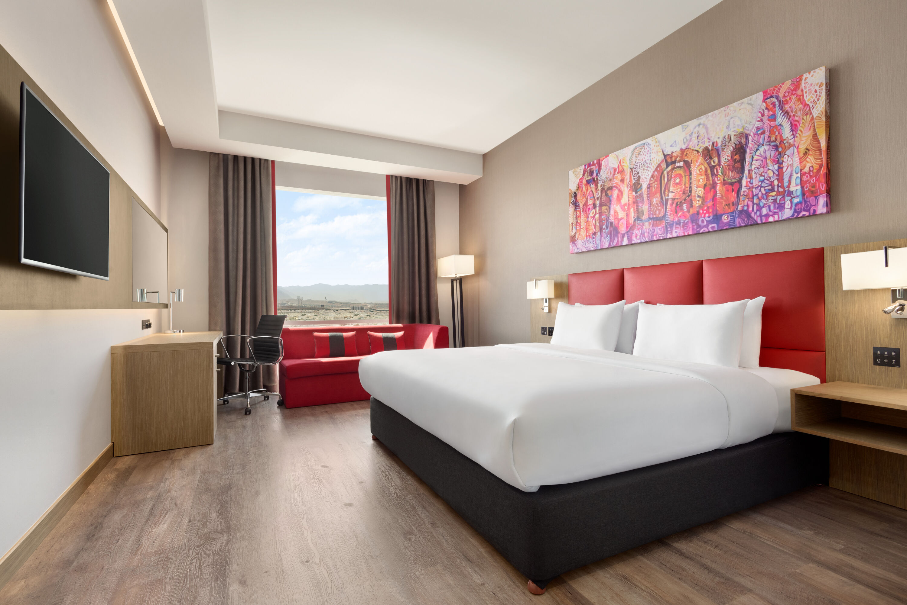 Guest room at the Ramada Encore by Wyndham Muscat Al-Ghubra in Muscat, Other than US/Canada