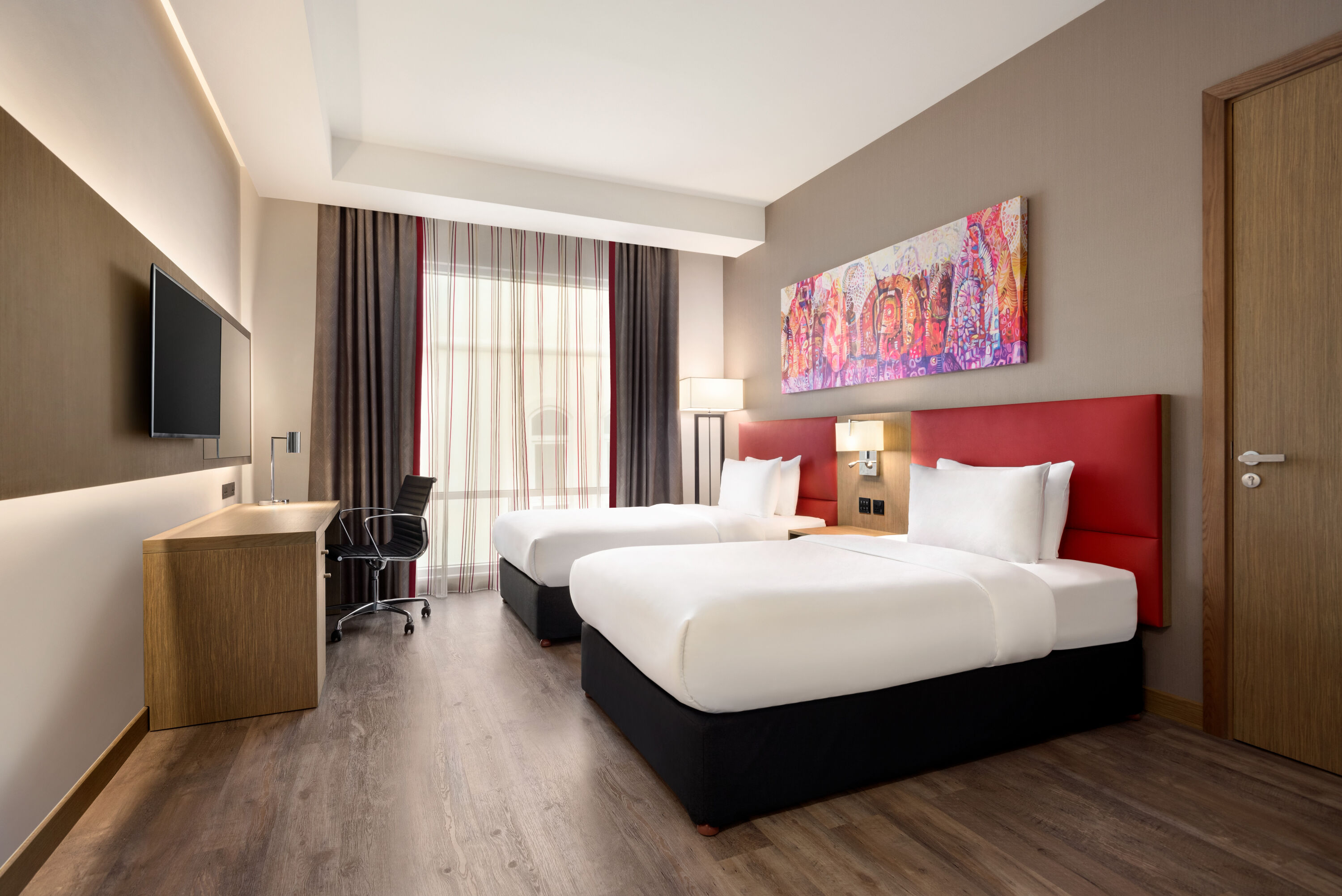 Guest room at the Ramada Encore by Wyndham Muscat Al-Ghubra in Muscat, Other than US/Canada