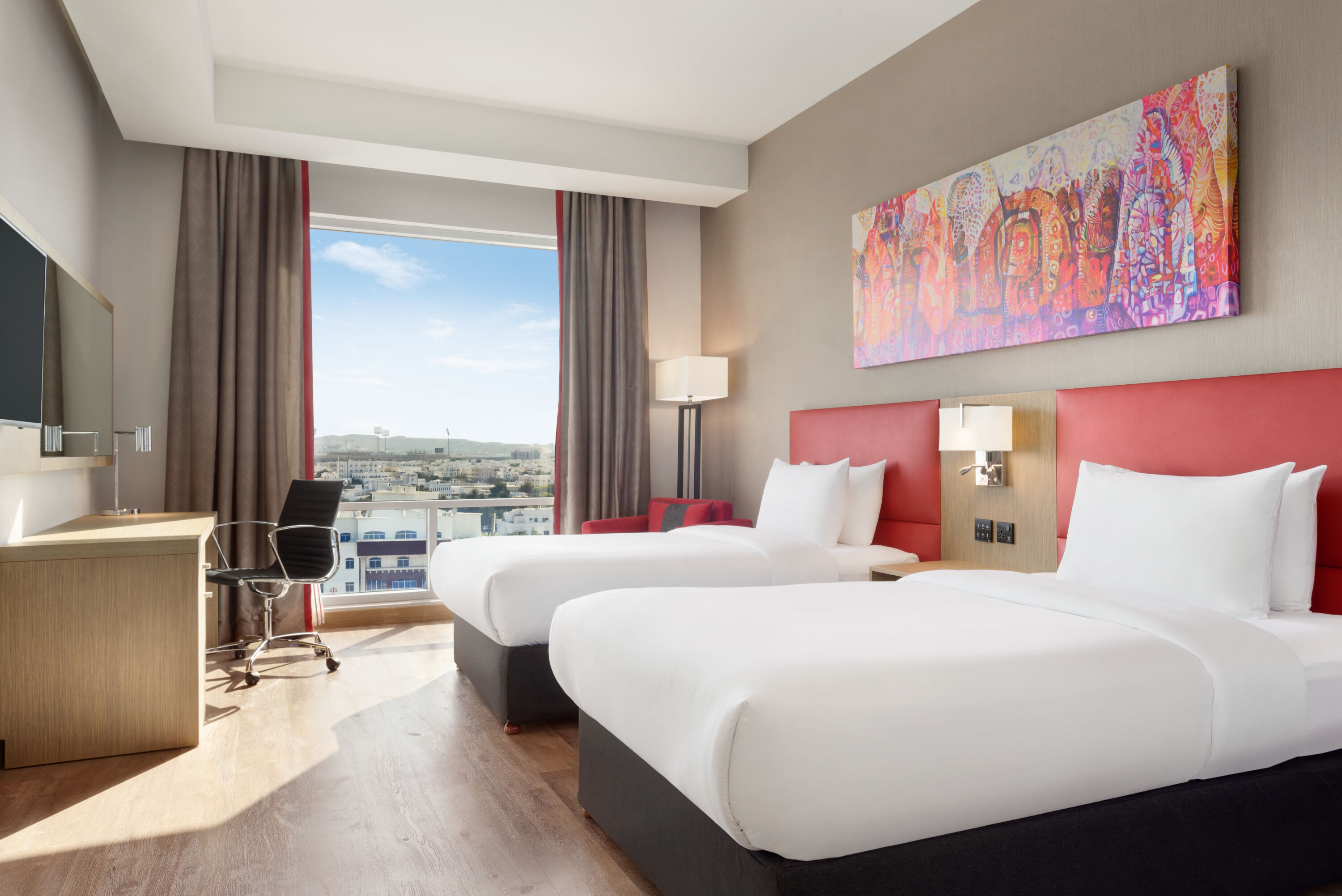 Guest room at the Ramada Encore by Wyndham Muscat Al-Ghubra in Muscat, Other than US/Canada